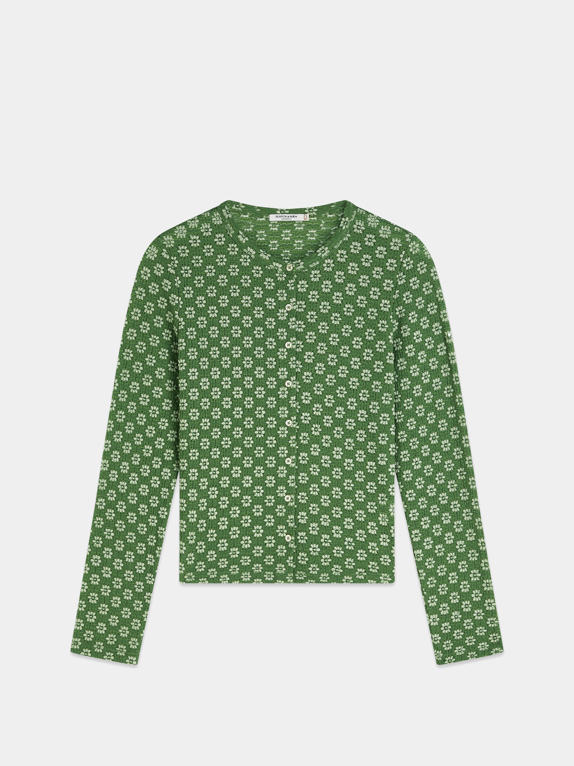 Long-sleeved button-up t-shirt from Scotch & Soda featuring a classic fit and detailed collar, displayed on a neutral background.
