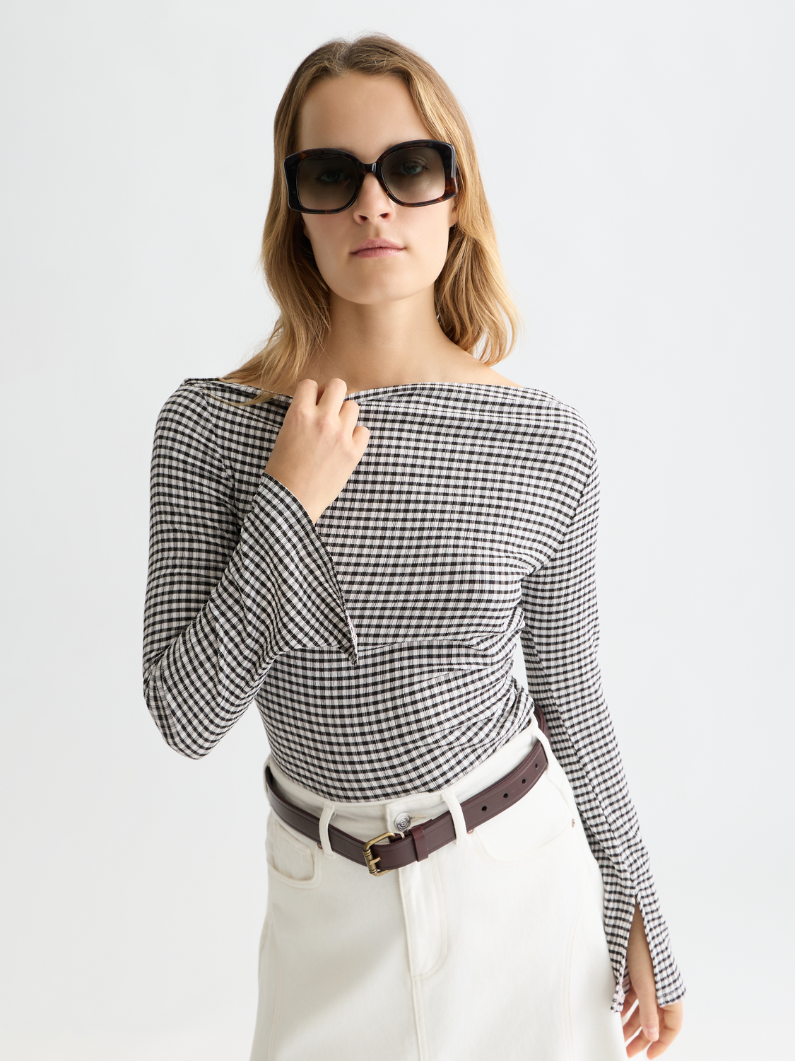 Gingham long-sleeved T-shirt by Scotch & Soda, featuring classic plaid pattern and casual fit, displayed on a neutral background.