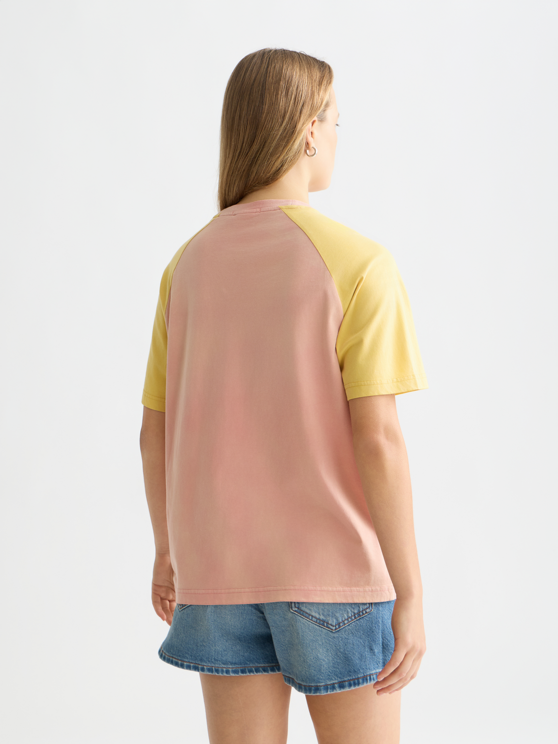 Scotch & Soda raglan artwork T-shirt with short sleeves, featuring colorful graphic design on the back and casual fit.