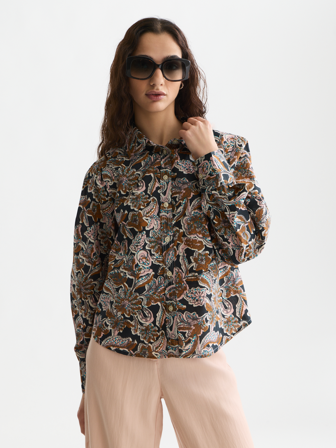 Long sleeve printed shirt by Scotch & Soda featuring a stylish design and vibrant colors, shown on a model.