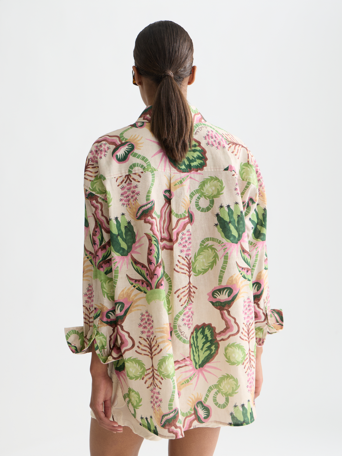 Long-sleeve printed shirt by Scotch & Soda featuring a vibrant pattern and a relaxed fit, shown from the back.