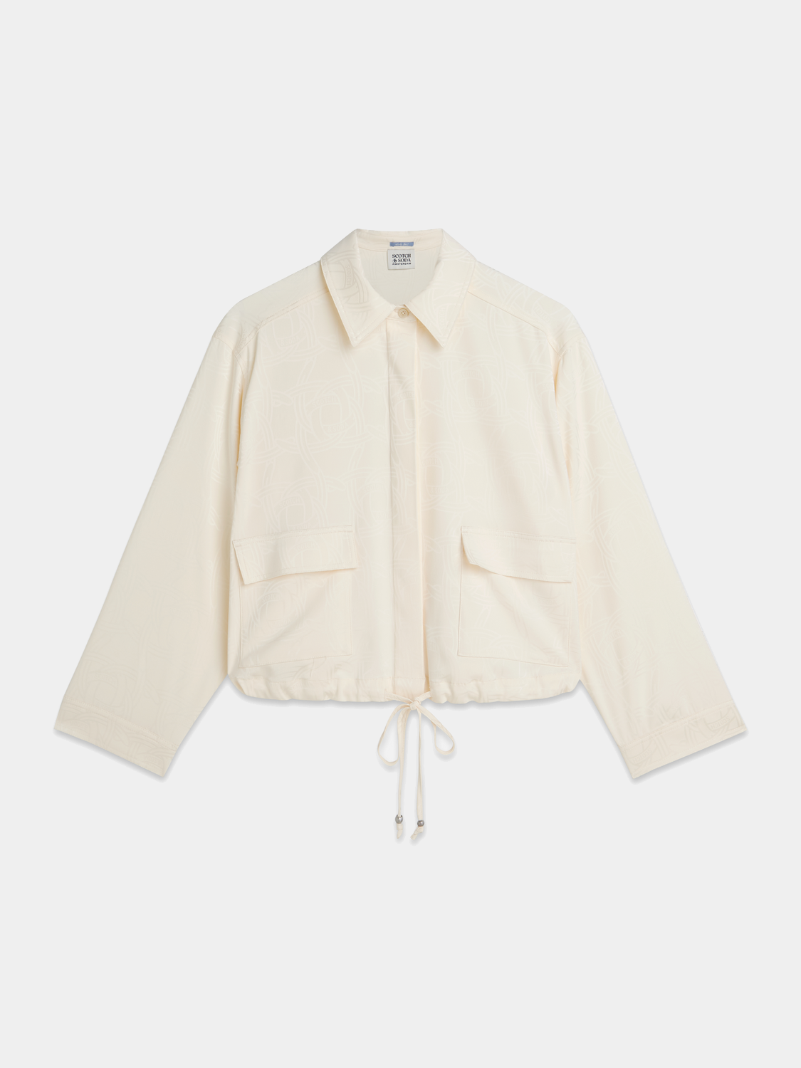 Long-sleeve utility shirt by Scotch & Soda featuring a button-up front, chest pockets, and casual fit, shown in a neutral color.