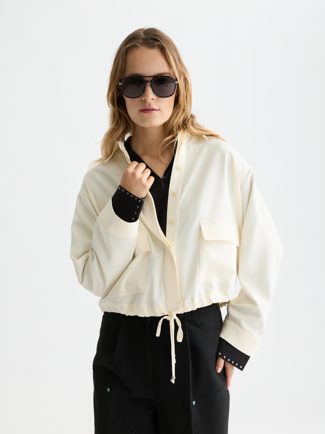 Long sleeve utility shirt by Scotch & Soda with front button closure and chest pockets, in a versatile design.