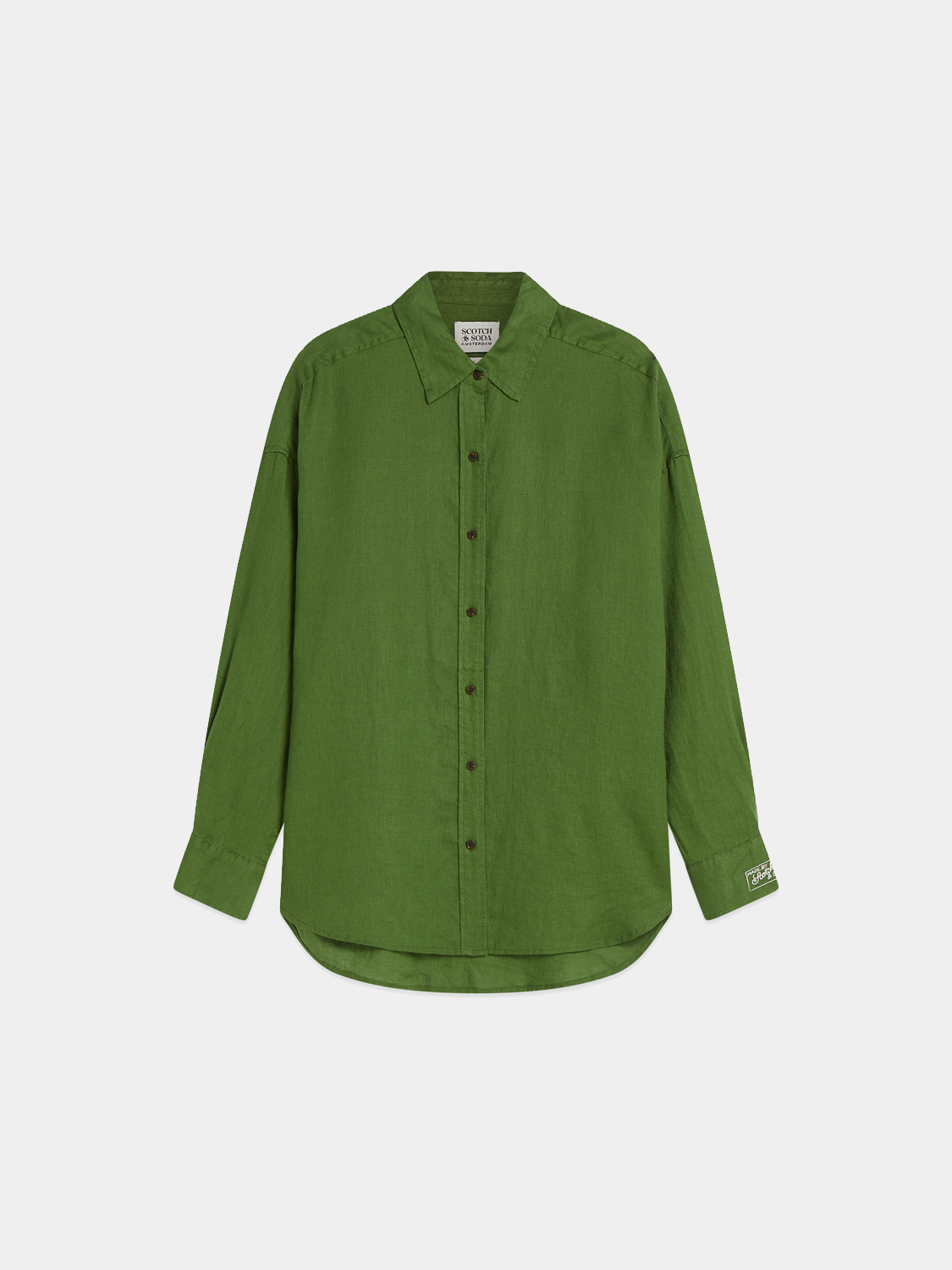 Light beige Scotch & Soda long-sleeve linen shirt with a classic collar and button closure, displayed on a hanger.