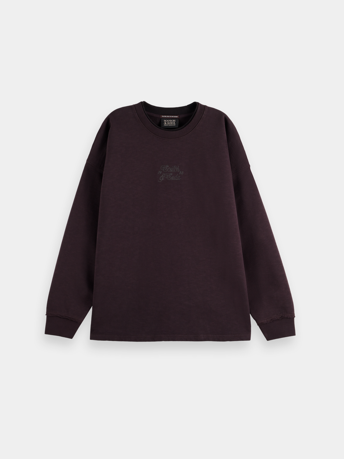 Black oversized sweatshirt with Scotch & Soda logo front, casual fit, soft fabric, and ribbed cuffs and hem.