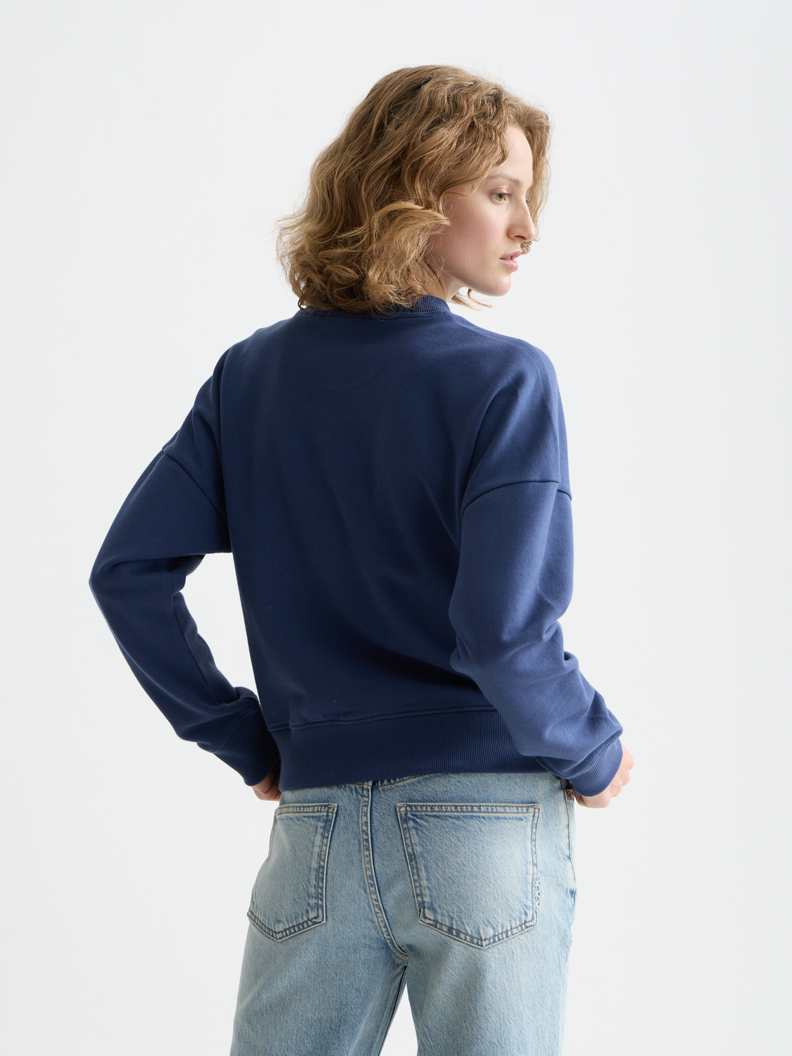 Scarlet embroidered logo sweatshirt by Scotch & Soda featuring a cozy crewneck design and detailed embroidery on the front.