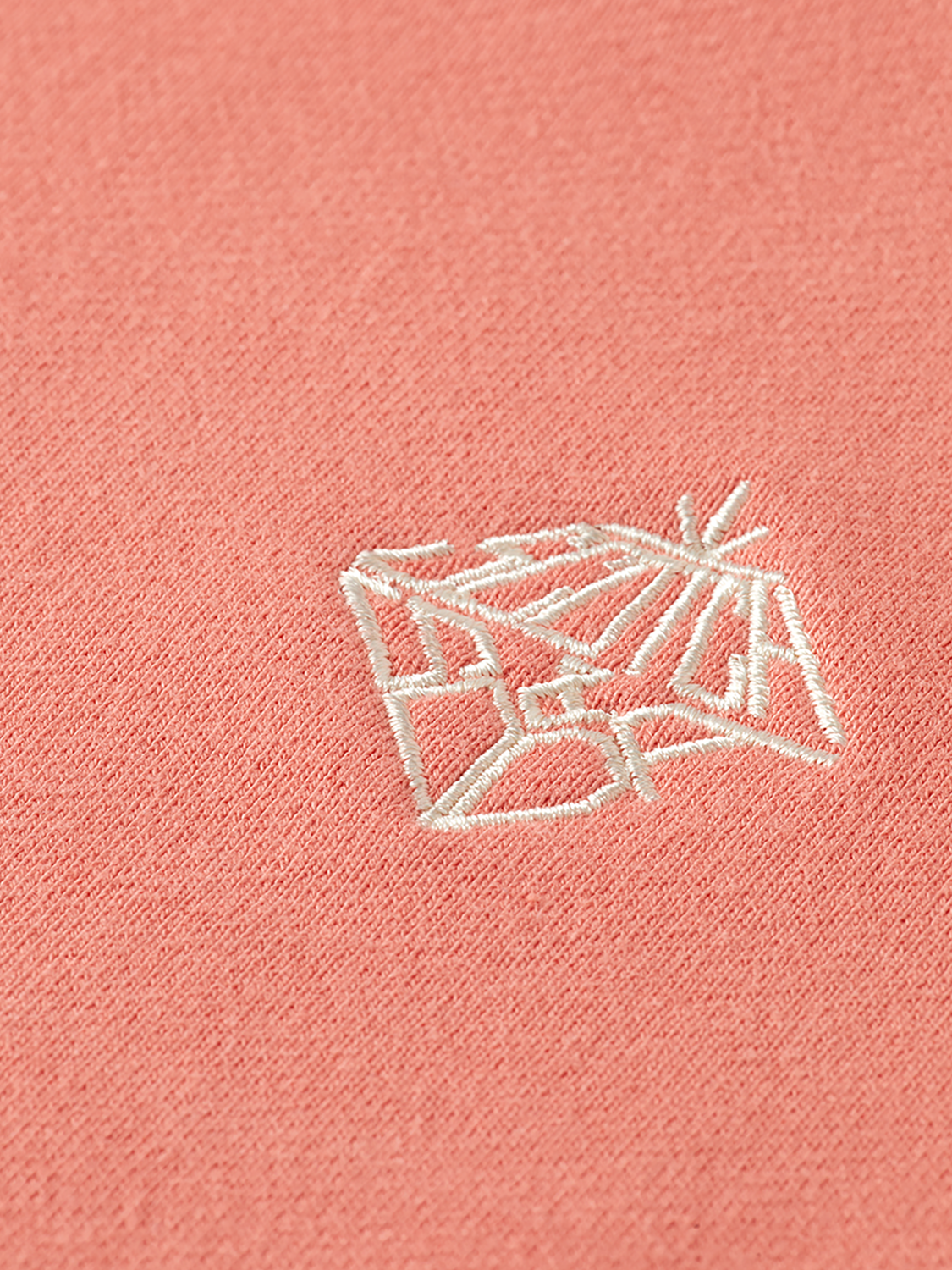 Cream-colored sweatshirt with embroidered logo from Scotch & Soda, featuring a casual fit and ribbed cuffs and hem.