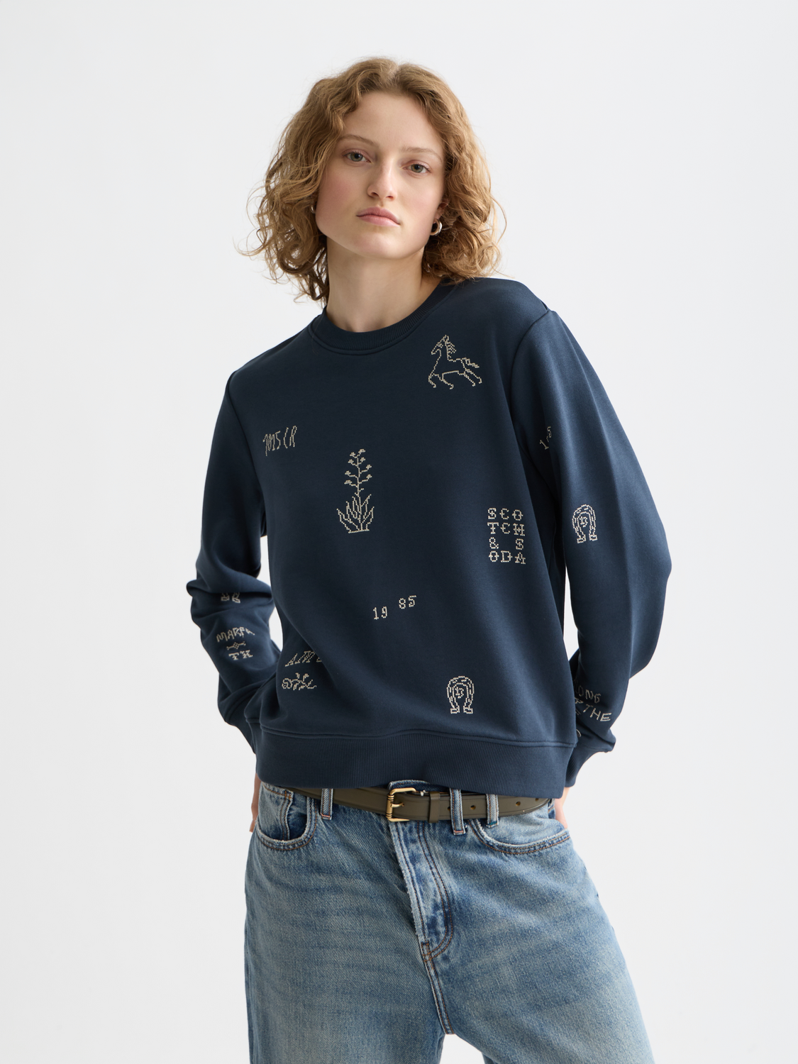 Embroidered sweatshirt by Scotch & Soda featuring detailed floral embroidery on a cozy, casual sweat fabric.