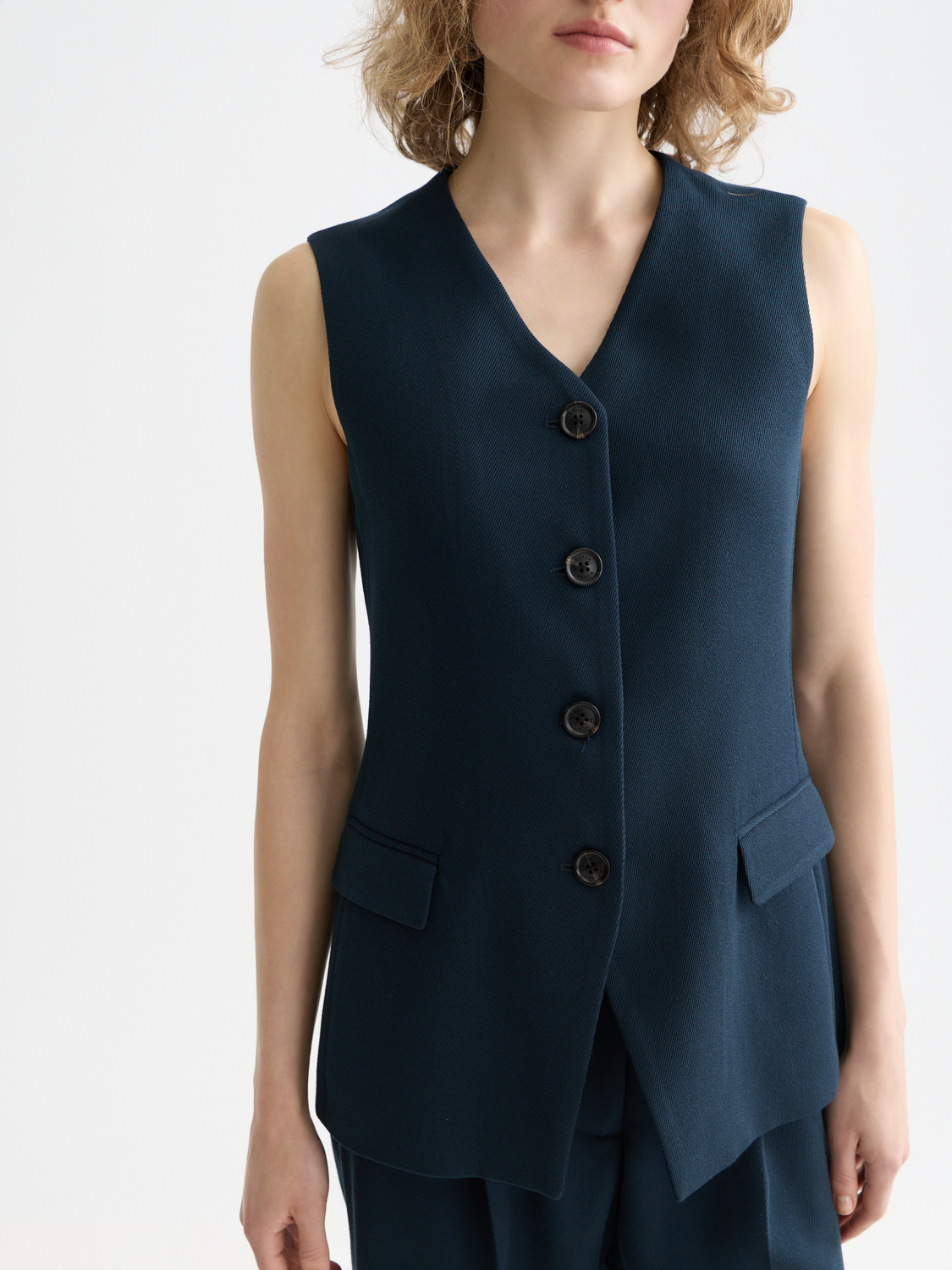 SCOTCH & SODA tailored gilet in neutral fabric, featuring a fitted design and front button closure.