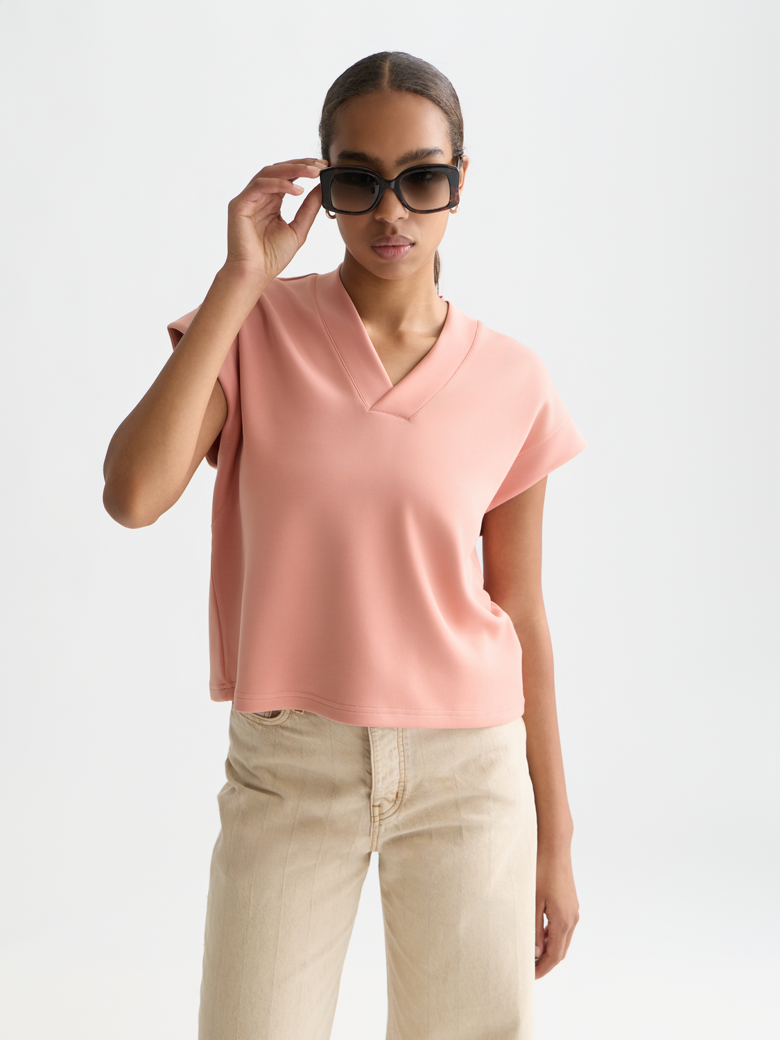 V-neck short-sleeved sweatshirt by Scotch & Soda, soft cotton fabric, casual fit, in a solid color.