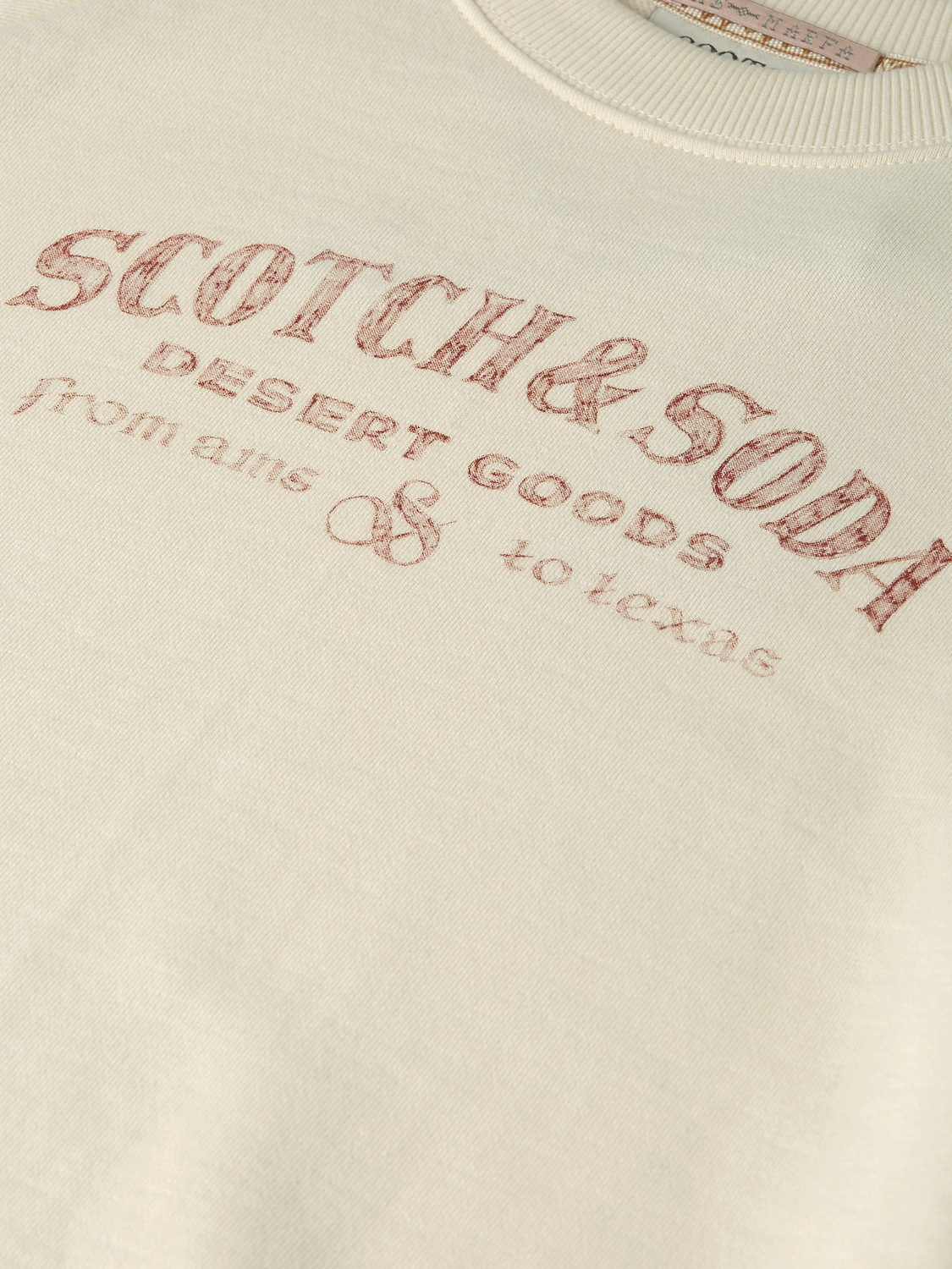 Short-sleeved artwork sweatshirt from SCOTCH & SODA with colorful graphic design on soft cotton fabric.