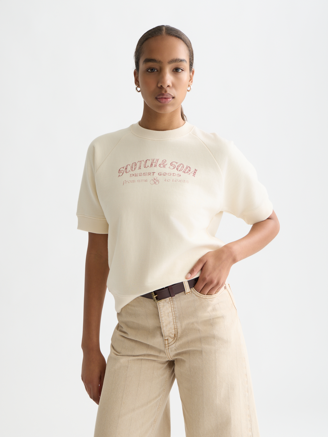 Short-sleeved artwork sweatshirt by Scotch & Soda featuring vibrant graphic design and casual fit.