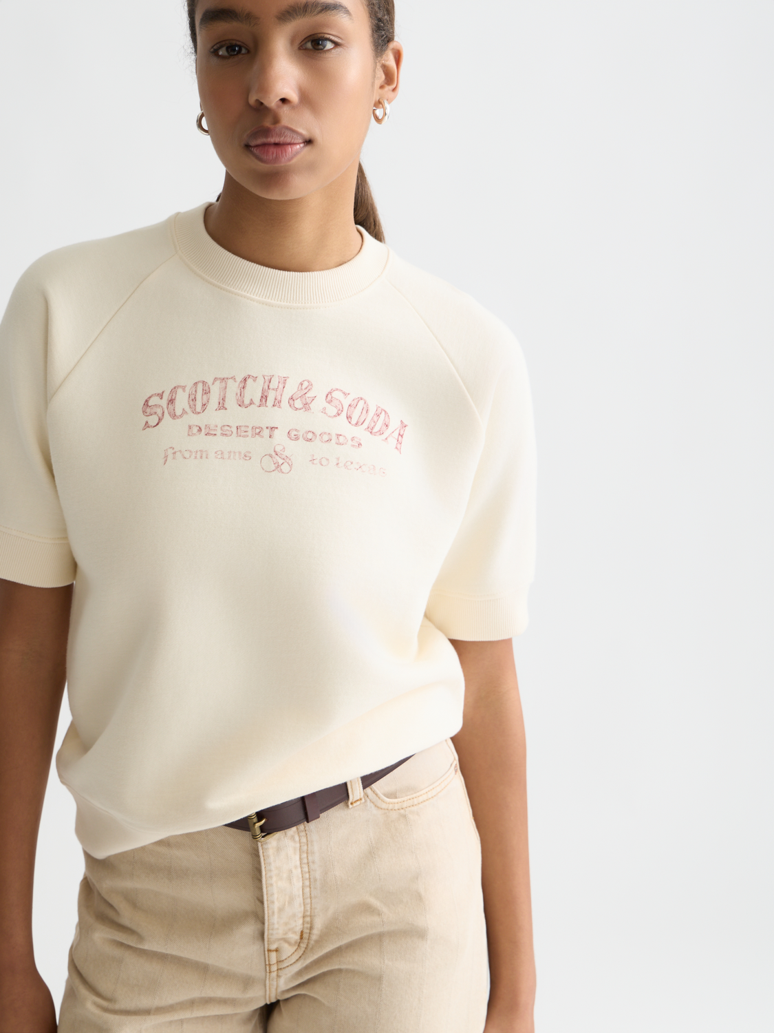 Short-sleeved artwork sweatshirt by Scotch & Soda, featuring colorful graphic design on soft fabric.