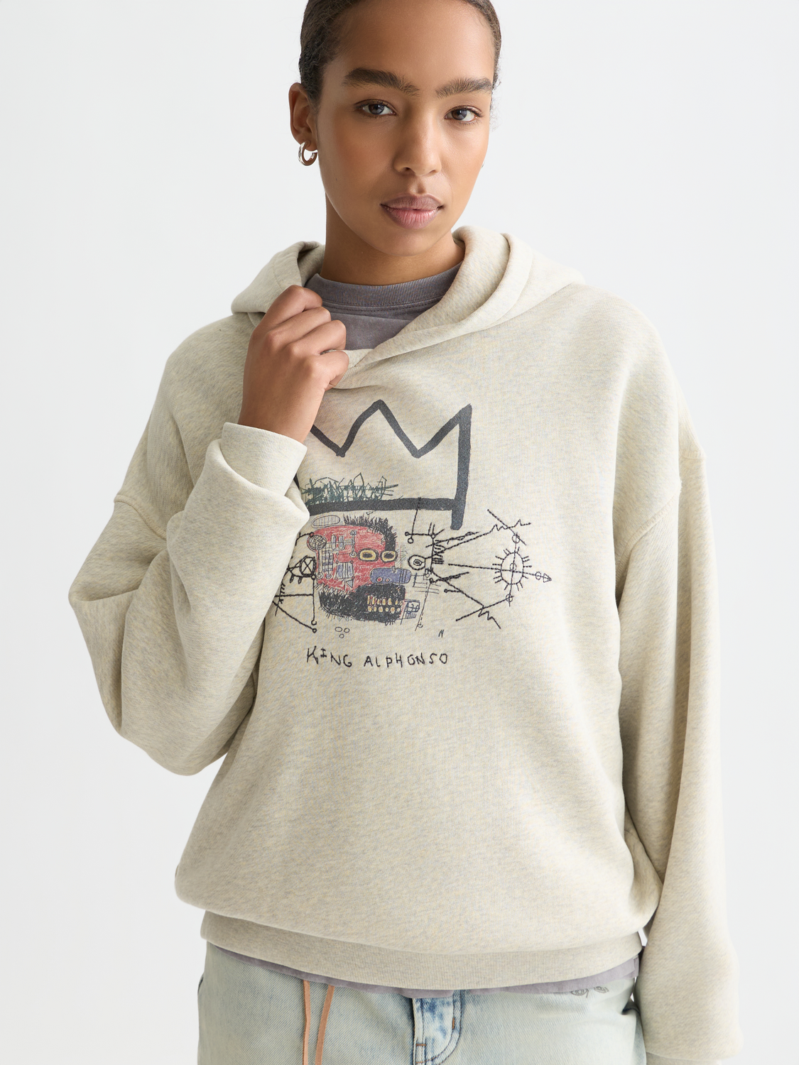 Scotch & Soda S&S x Basquiat washed artwork hoodie featuring a colorful Basquiat-inspired print on soft sweats fabric.
