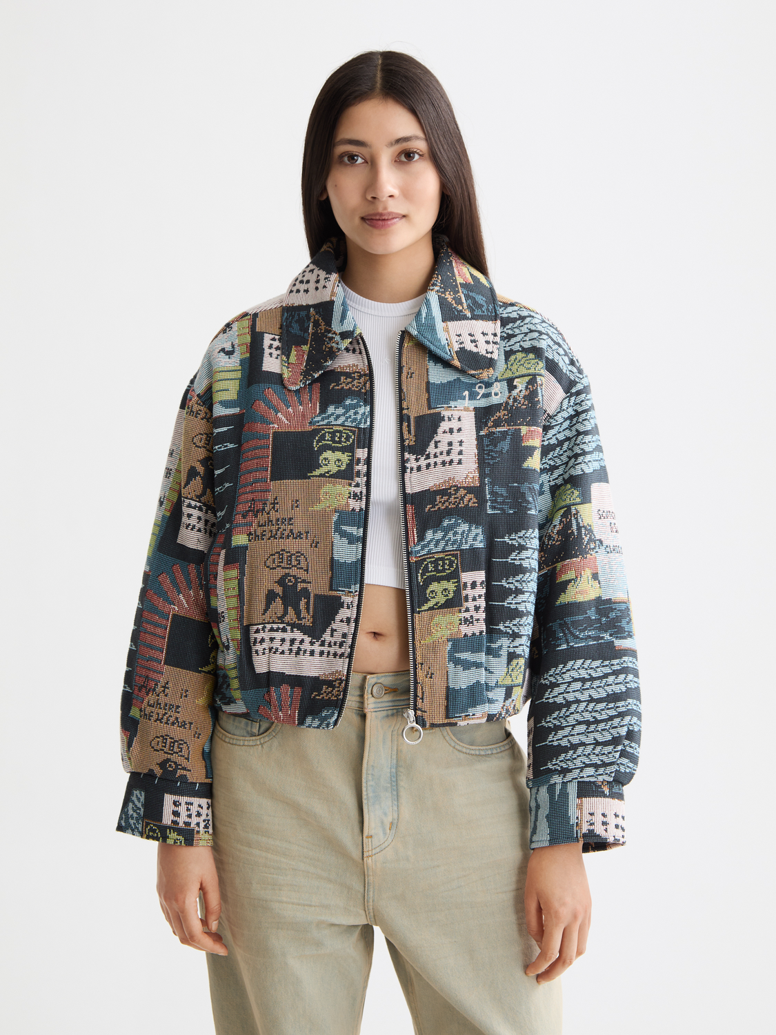 Scotch & Soda jacquard jacket featuring intricate woven patterns and a tailored fit, shown on a model front view.