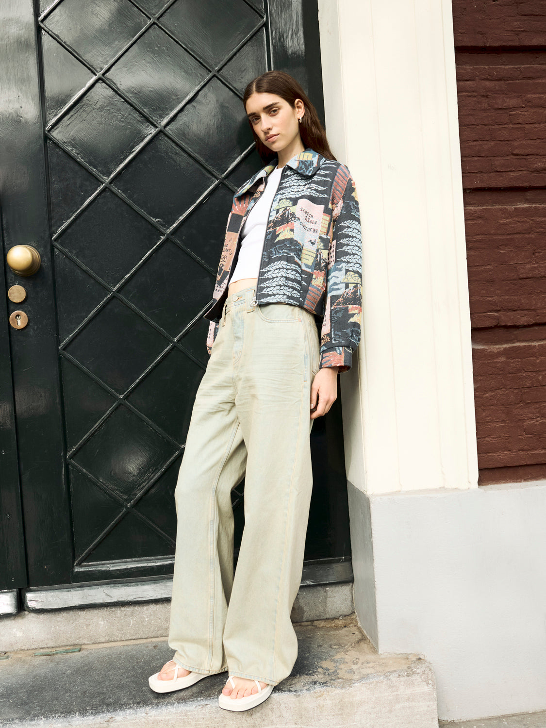 Deep loose-fit denim jeans by Scotch & Soda, shown with relaxed fit and classic denim texture.