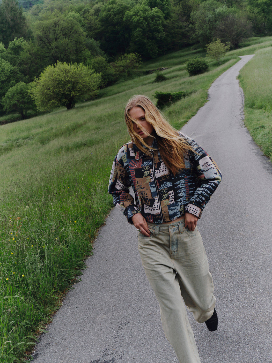 Scotch & Soda jacquard jacket with intricate woven pattern, tailored fit, and stylish design, shown on a model.