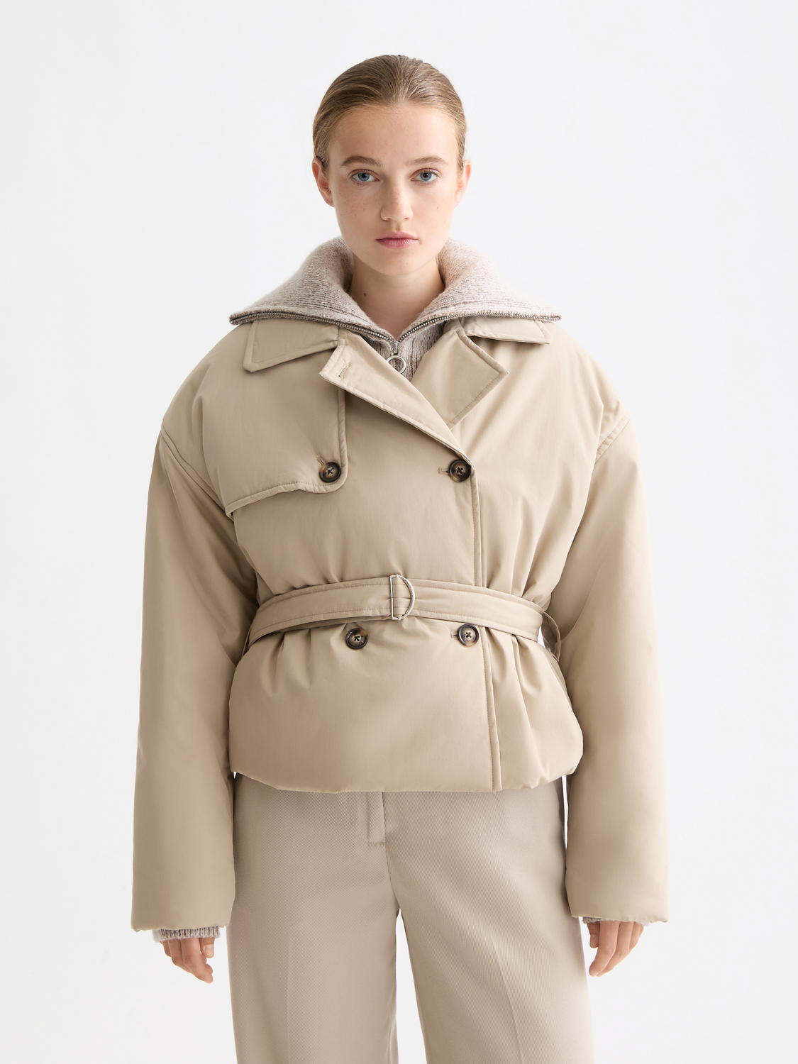 Padded cropped trench coat by Scotch & Soda, stylish jacket with a fitted silhouette and button details, shown on a model.