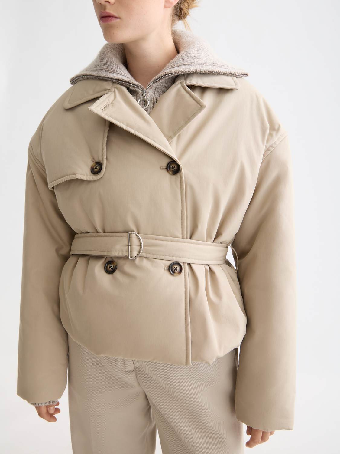 Padded cropped trench coat by Scotch & Soda, stylish lightweight jacket with a fitted design, shown on a model.