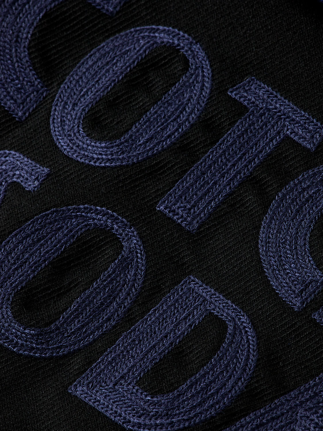 Embroidered bomber jacket by Scotch & Soda featuring detailed stitching and stylish design, displayed on a hanger.