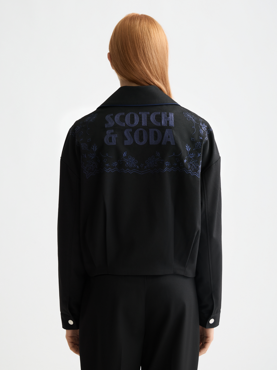 Embroidered bomber jacket by Scotch & Soda featuring detailed embroidery, ribbed cuffs, and a classic zip front design.