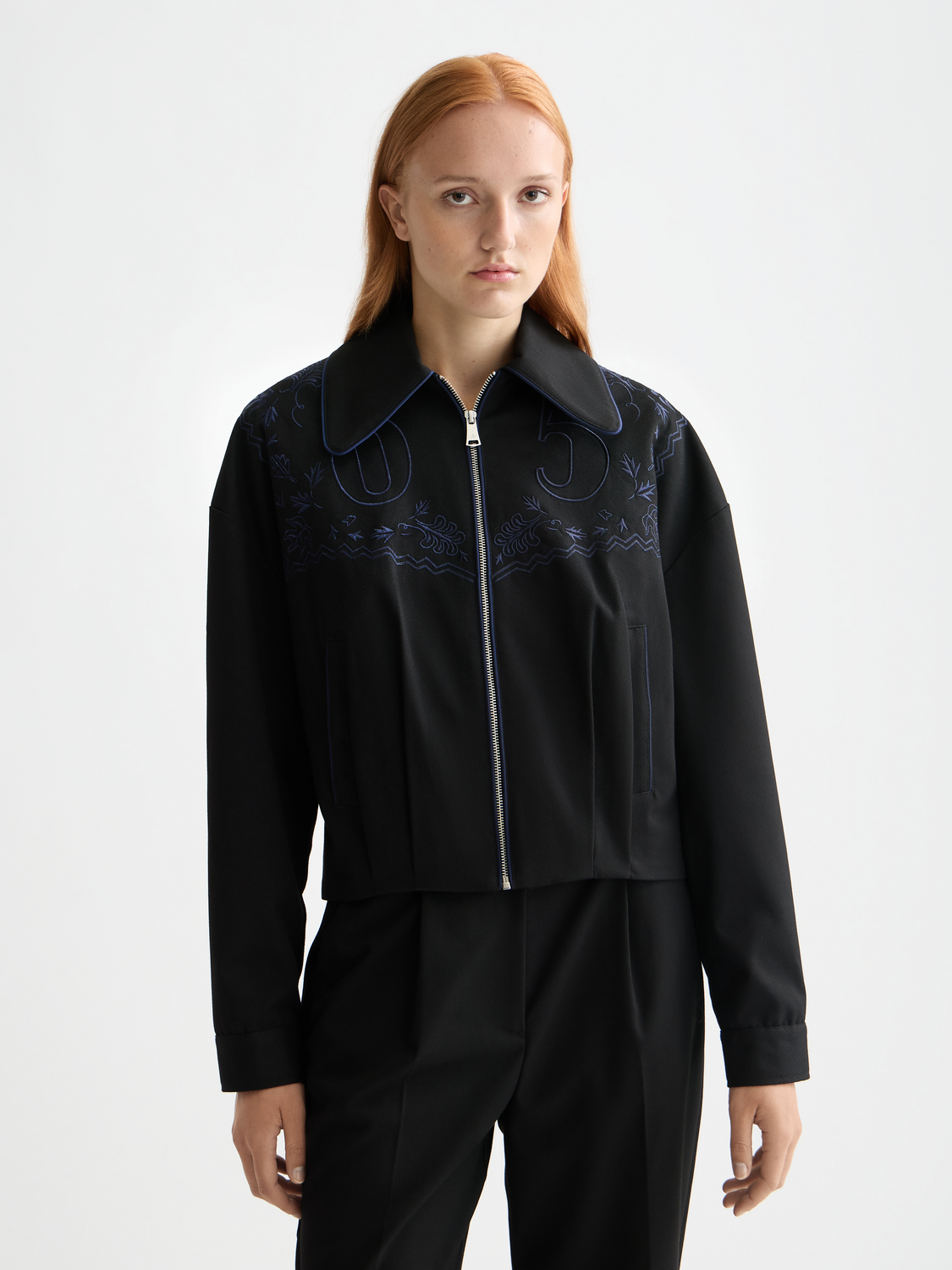 Embroidered bomber jacket from Scotch & Soda featuring intricate embroidery, front zipper, and ribbed cuffs and collar.