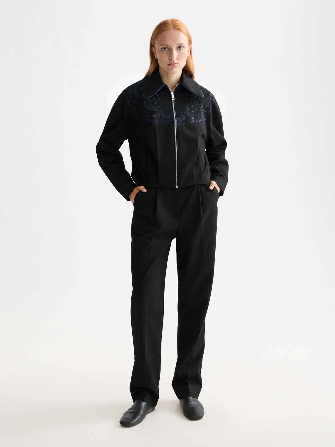 Embroidered bomber jacket by Scotch & Soda featuring detailed embroidery, front zipper, and ribbed cuffs and collar.