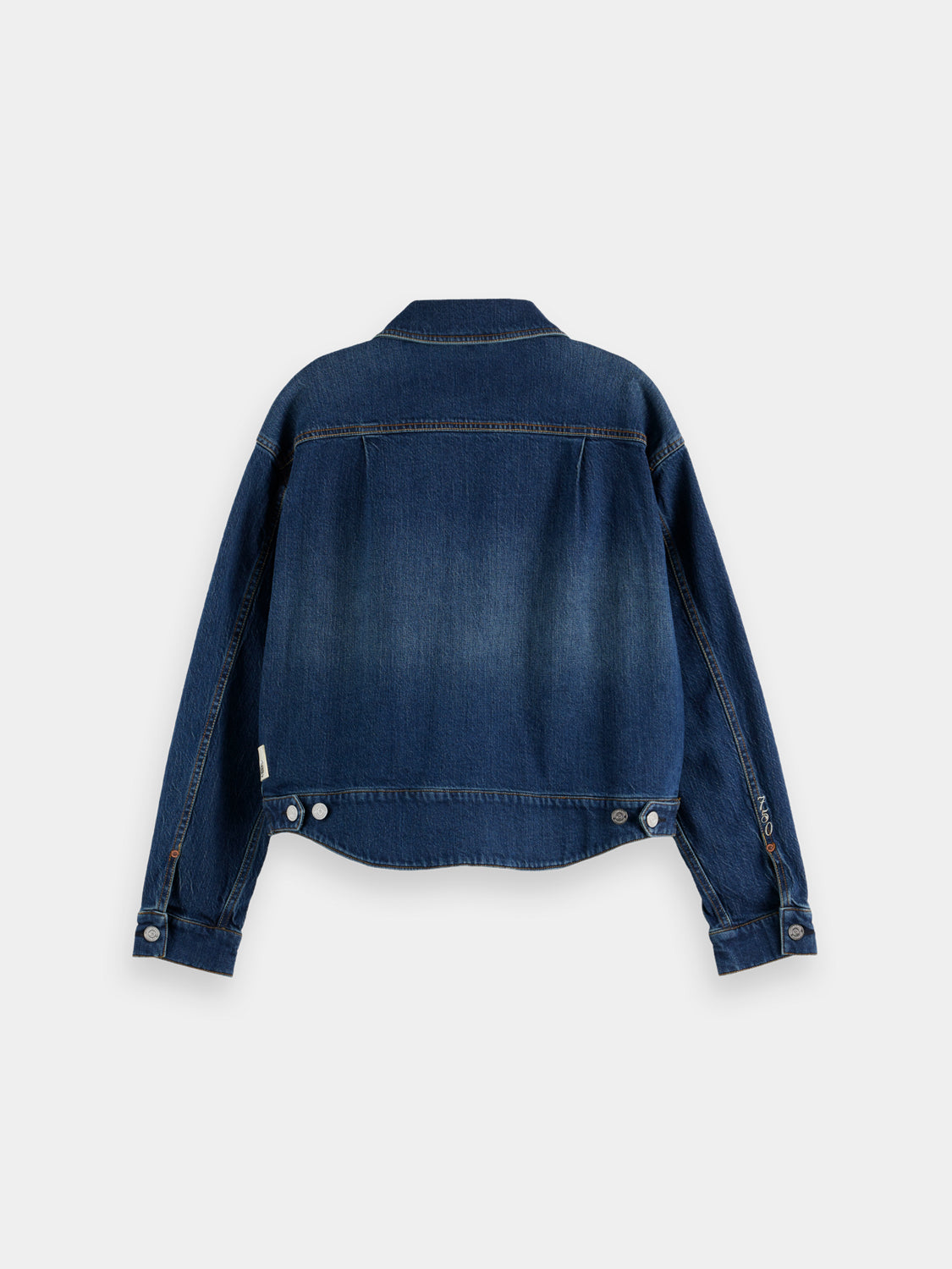 Cropped denim jacket by Scotch & Soda, featuring classic blue denim, button front, and collar, displayed on a hanger.