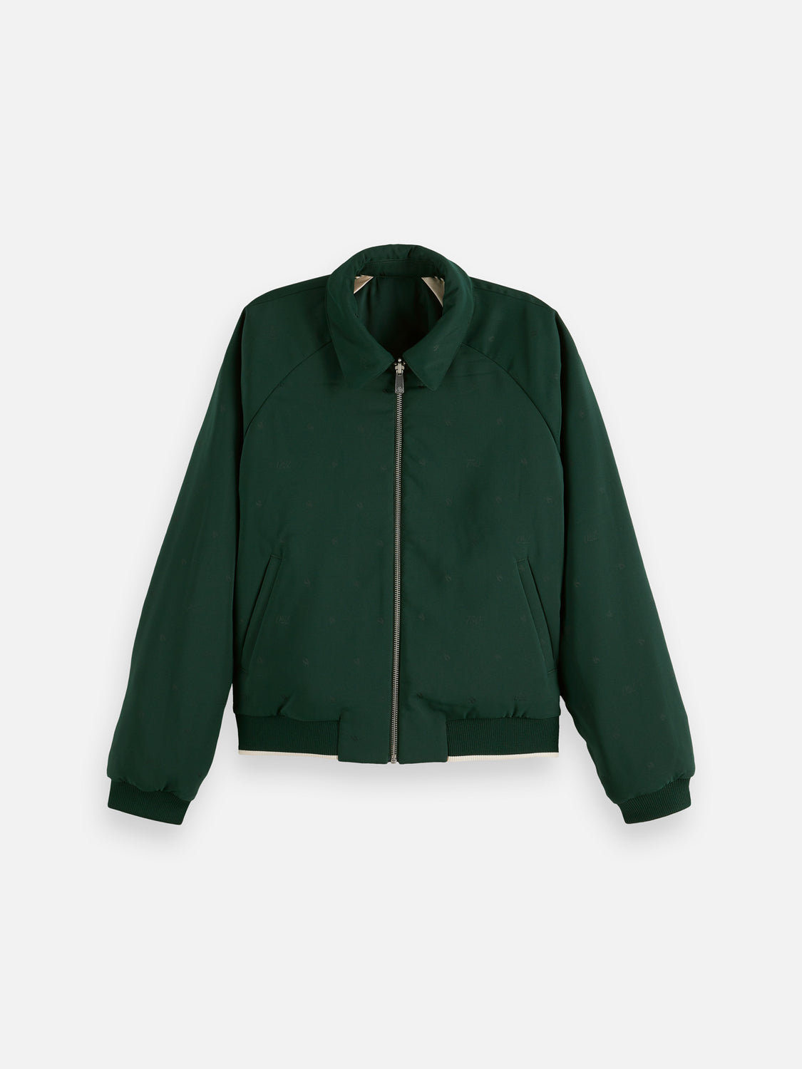 Reversible souvenir jacket by Scotch & Soda with vibrant patterns and casual style, shown on a hanger.