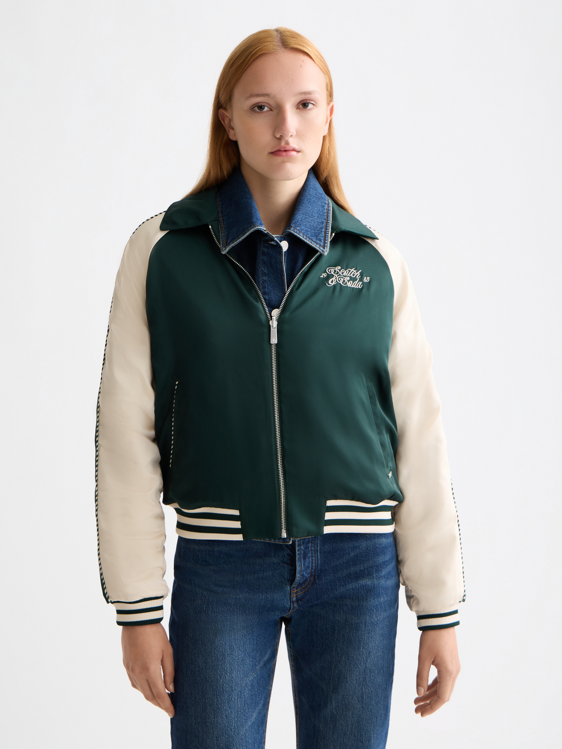 Reversible souvenir jacket by Scotch & Soda featuring bold patterns and vibrant colors, displayed on a model.