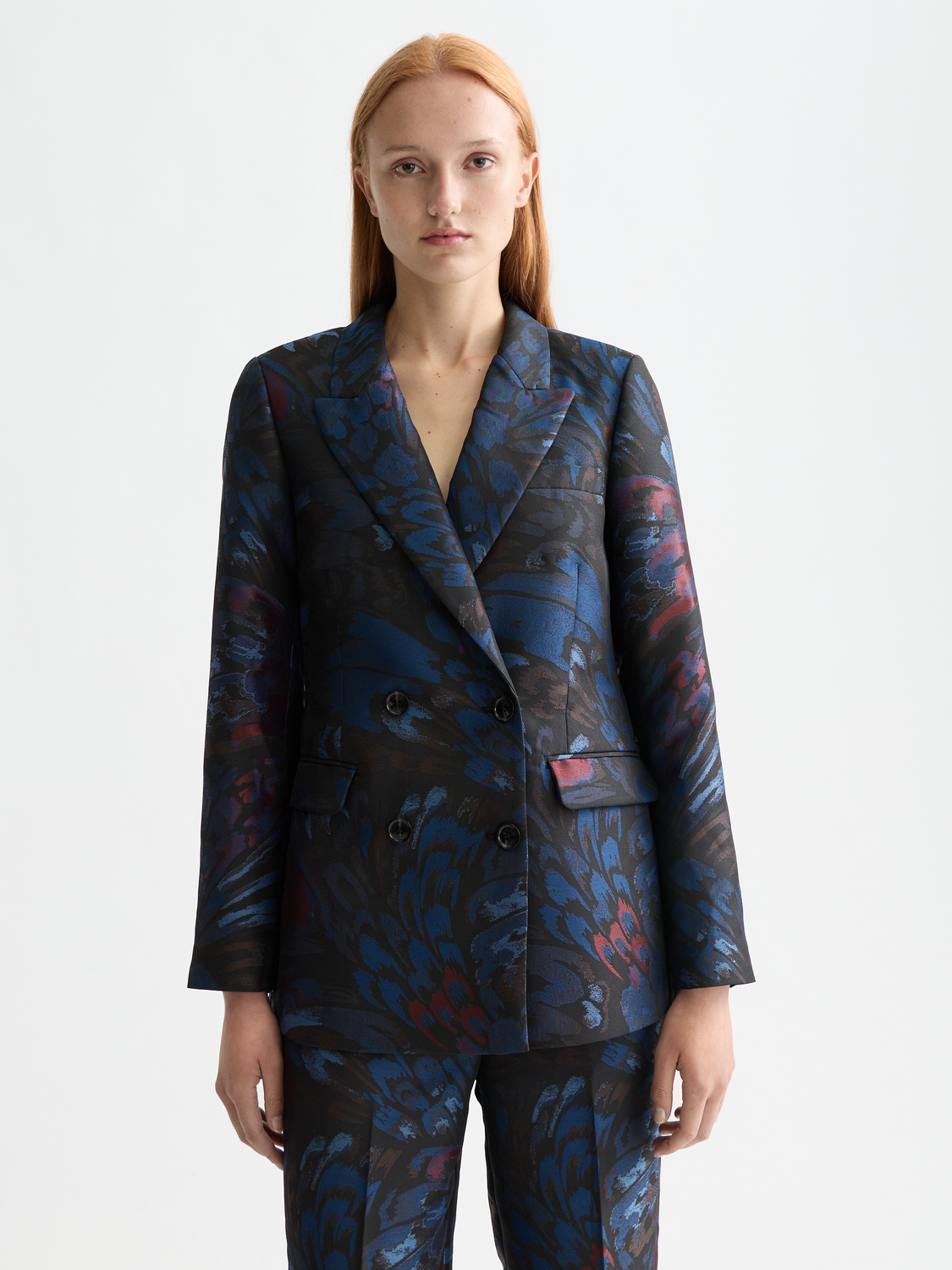 Scotch & Soda jacquard blazer featuring a tailored fit, intricate woven pattern, and classic lapel collar for a sophisticated look.