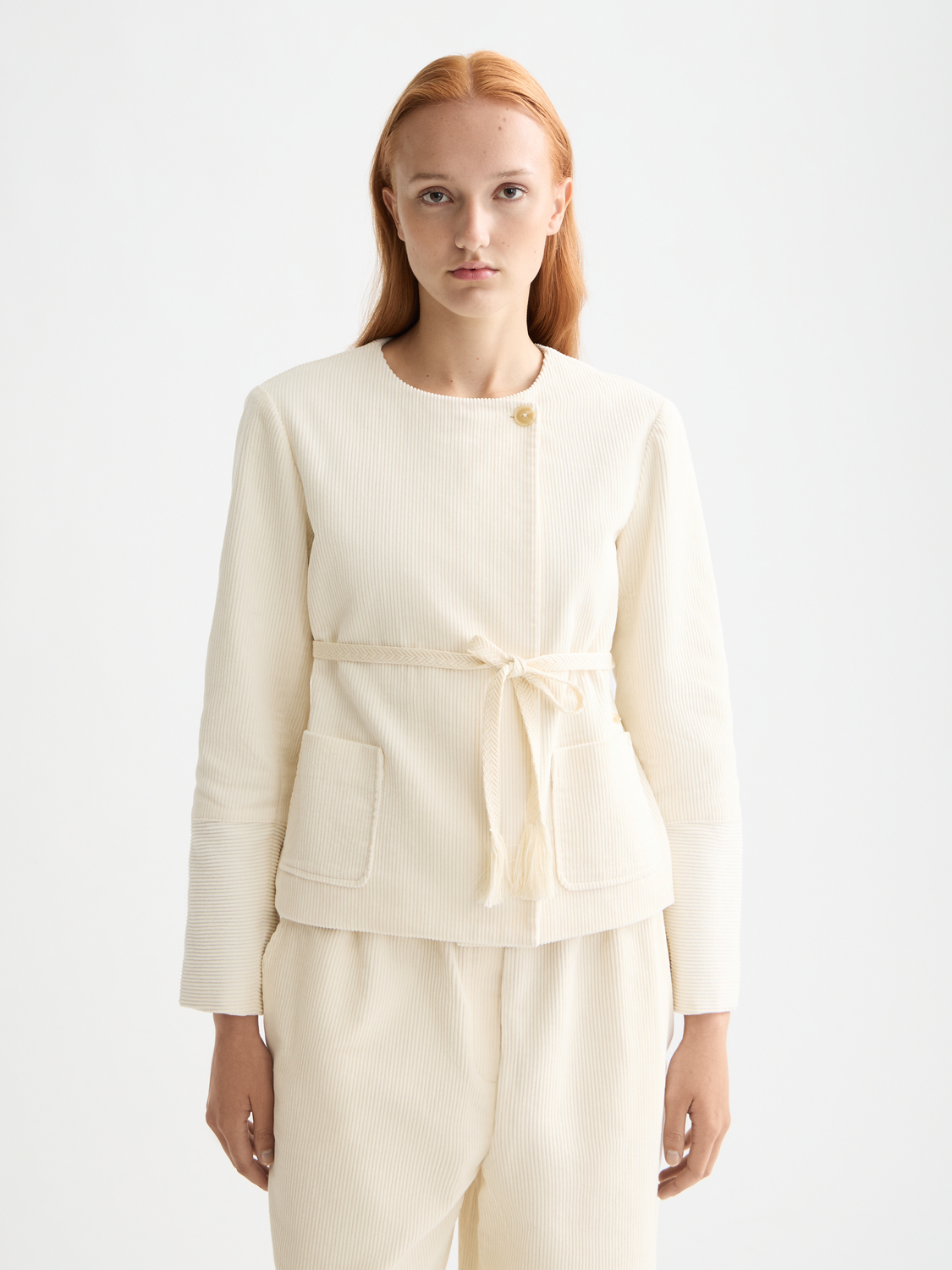 Scotch & Soda belted collarless blazer with tailored fit, featuring a sleek design and front button closure.