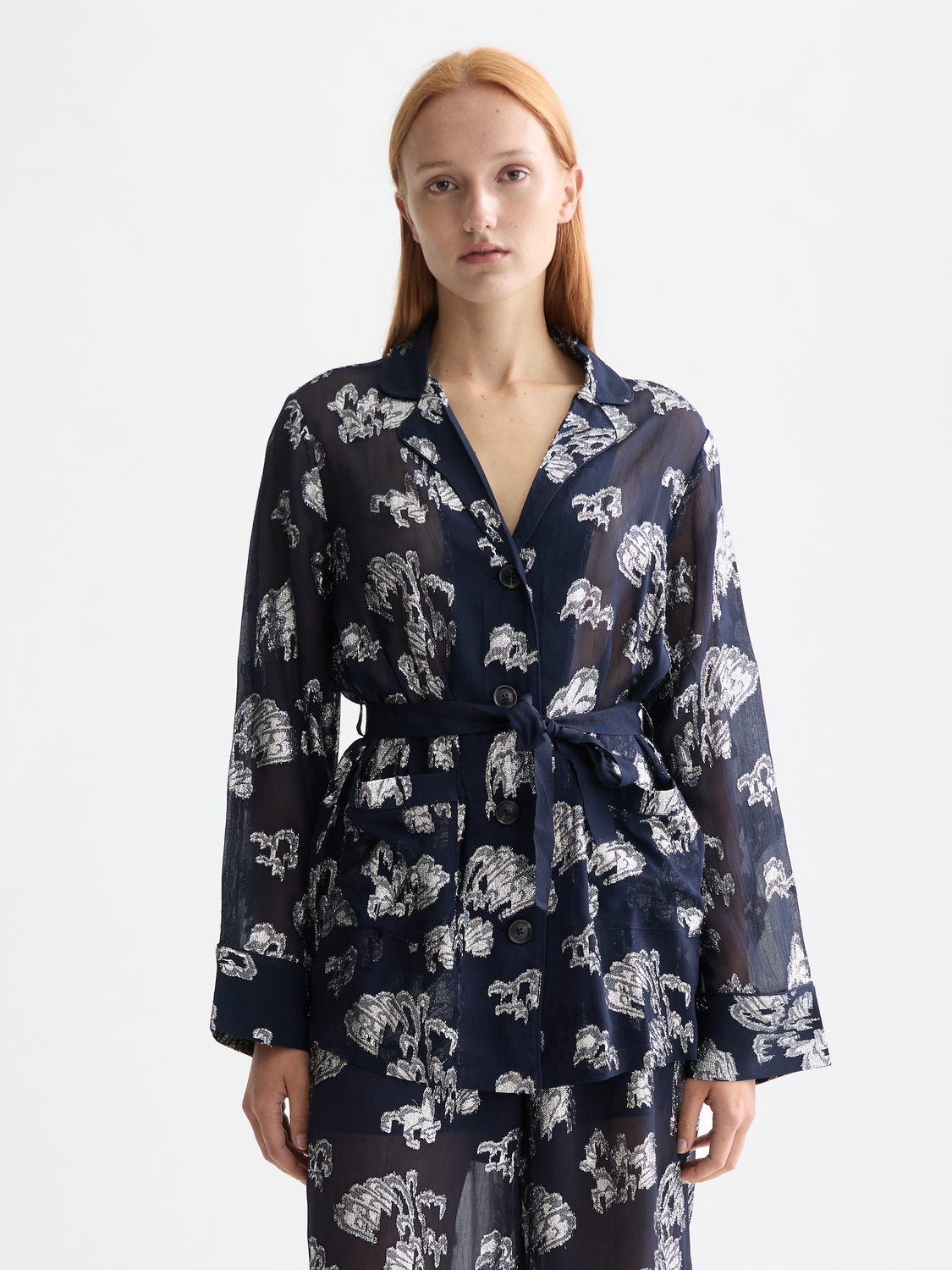 Scotch & Soda pyjama blazer featuring a tailored fit, soft fabric, and classic design with a button-up front and lapel collar.