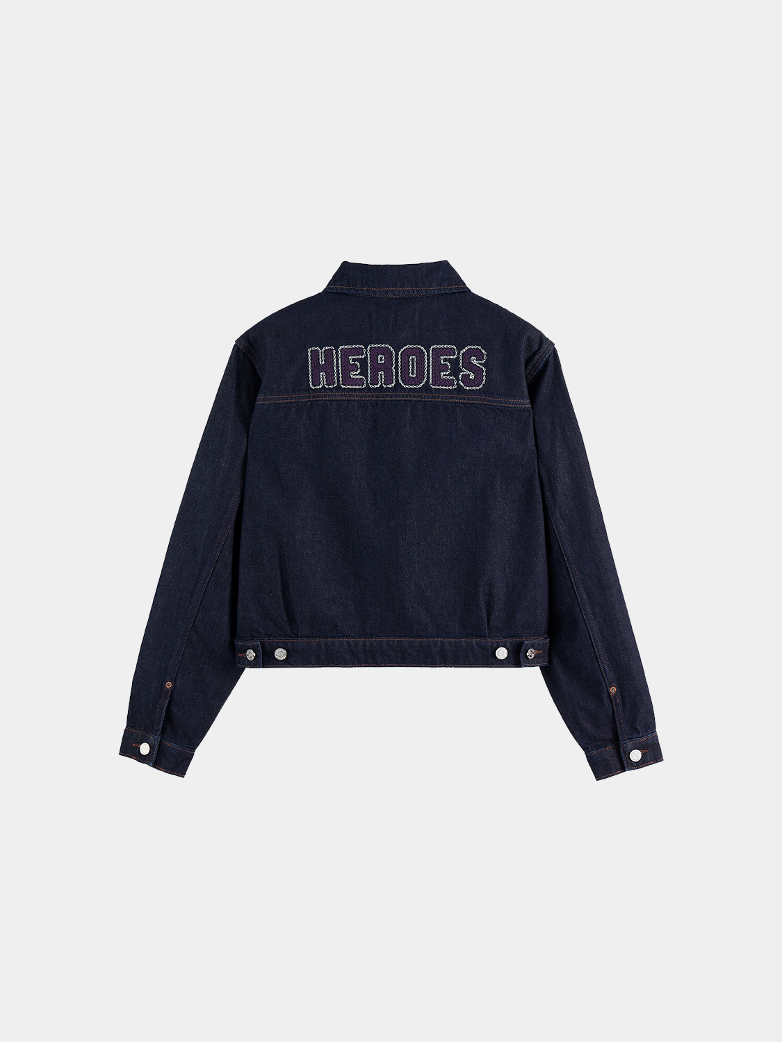 Embroidered denim jacket by Scotch & Soda featuring colorful floral embroidery on classic blue denim.