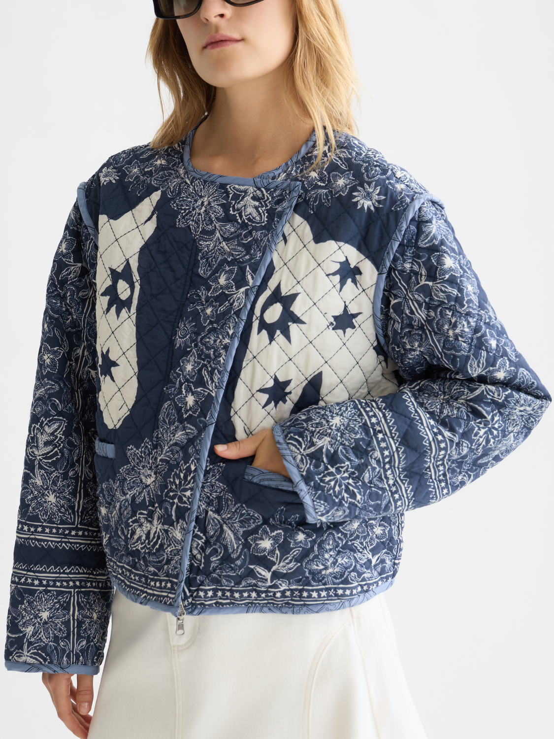 Reversible quilted bomber jacket by Scotch & Soda, featuring a stylish quilted design and versatile wear options.