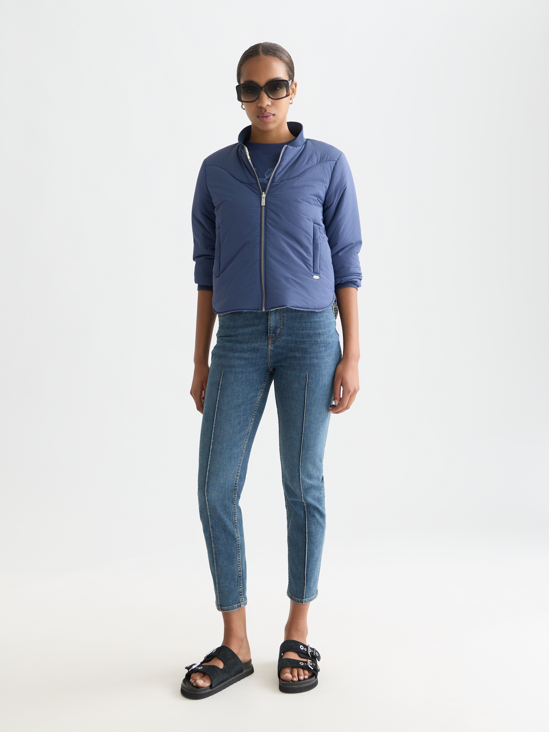 Reversible bomber jacket by Scotch & Soda featuring a stylish design, shown with both sides visible in the image.