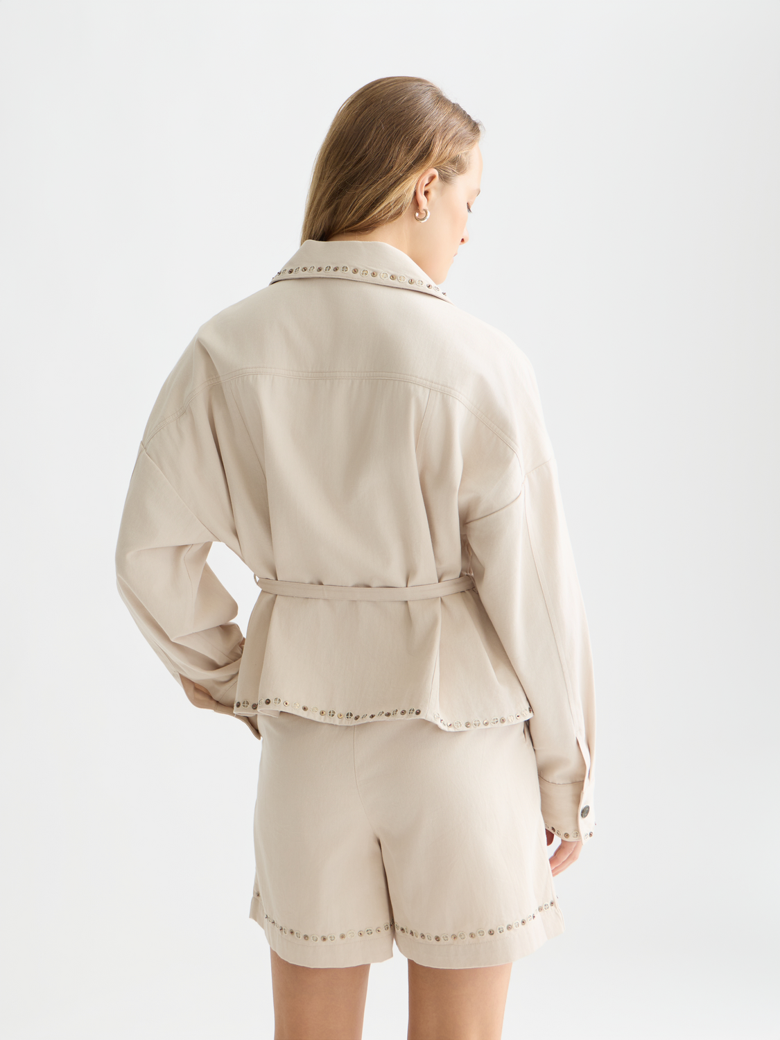 Embellished Scotch & Soda trucker jacket with decorative details, shown from the back view.