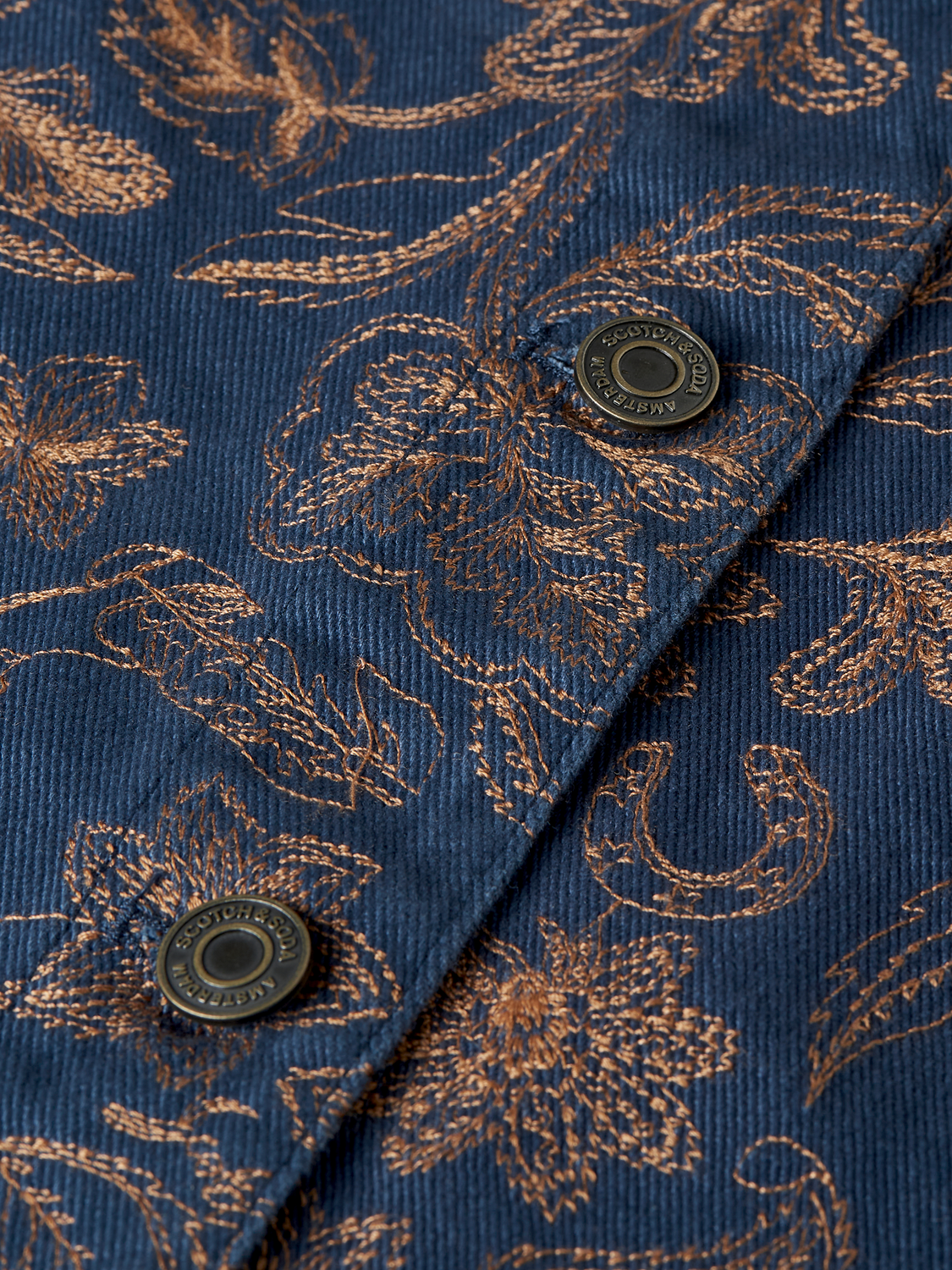 Embroidered Scotch & Soda jacket with detailed floral embroidery, stylish design, and lightweight fabric for casual wear.