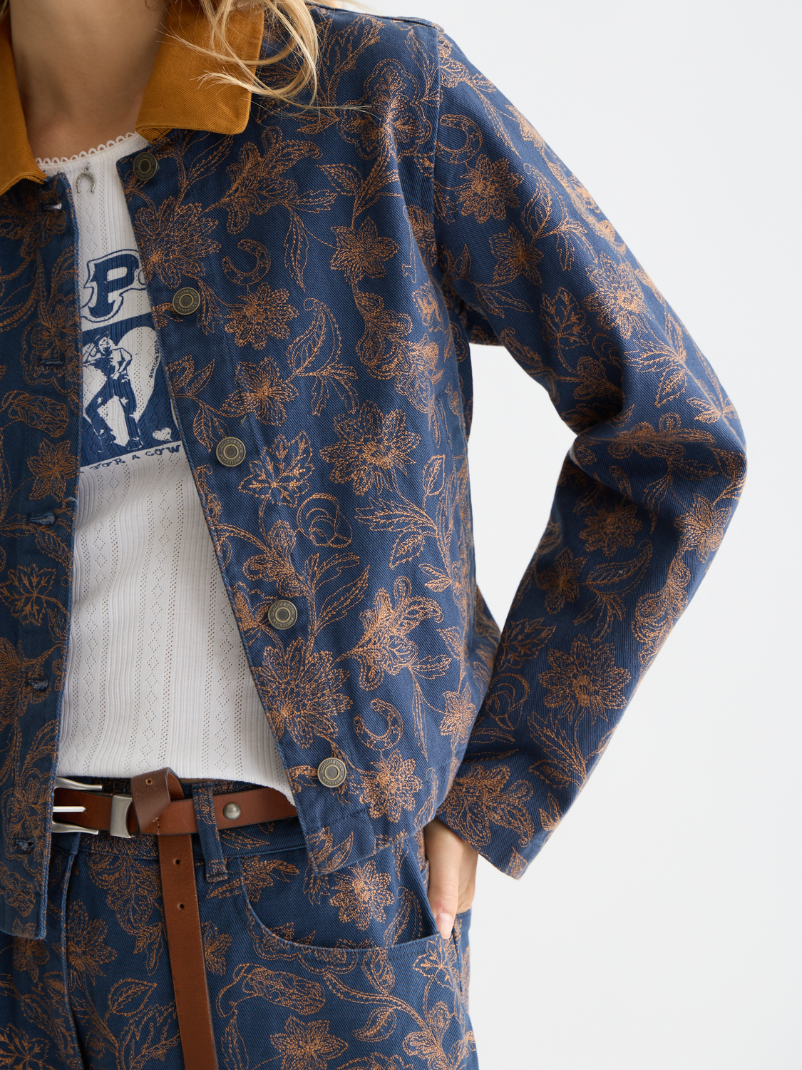 Embroidered Scotch & Soda jacket with detailed floral embroidery, stylish design, and button closure, shown on a model.