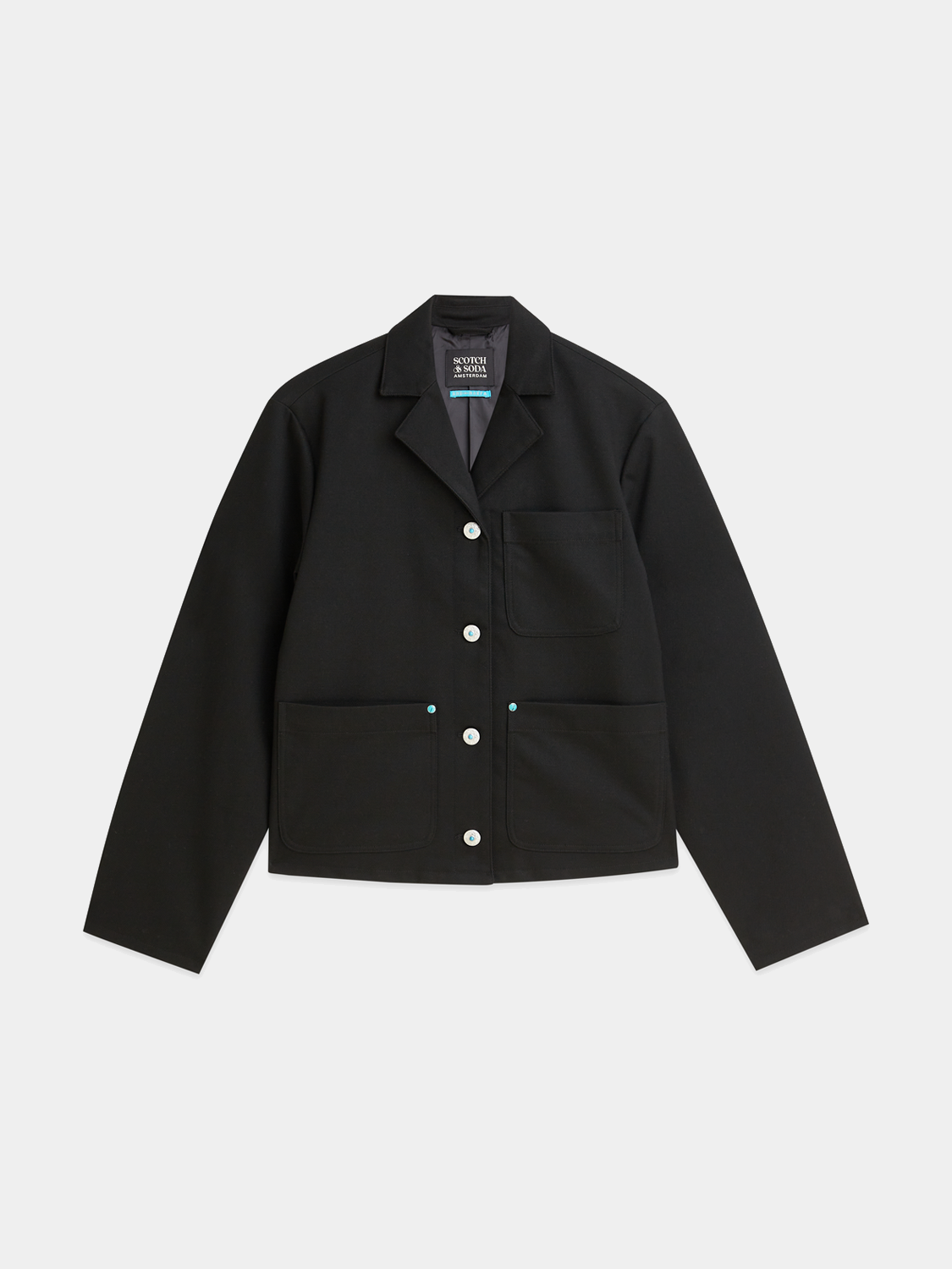 Western trucker jacket by Scotch & Soda, showing classic denim style with button closure and chest pockets.