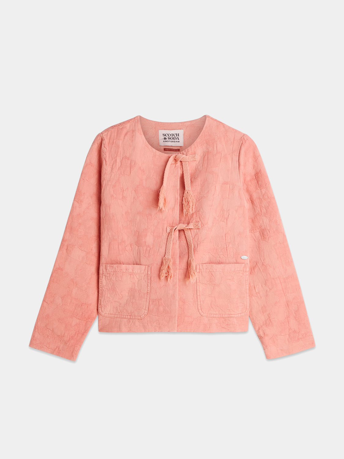 Structured jacquard blazer by Scotch & Soda, featuring a tailored fit and intricate woven pattern, displayed on a hanger.