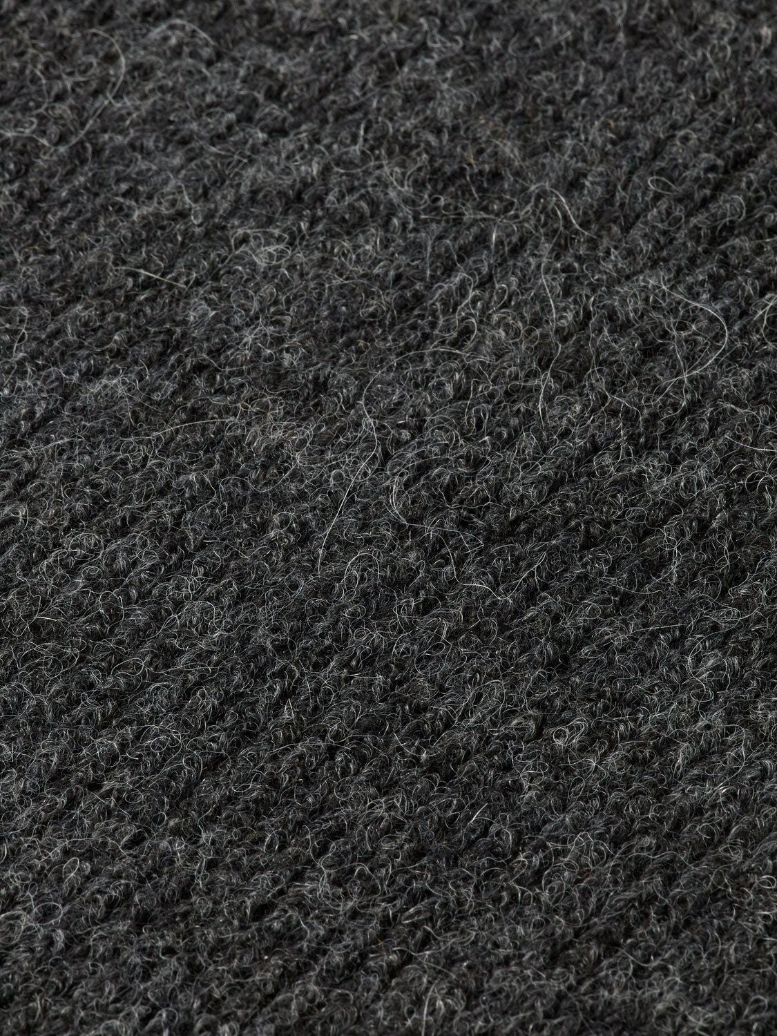 Knitted logo scarf from SCOTCH & SODA featuring a cozy design with a prominent logo pattern in soft, warm yarn.