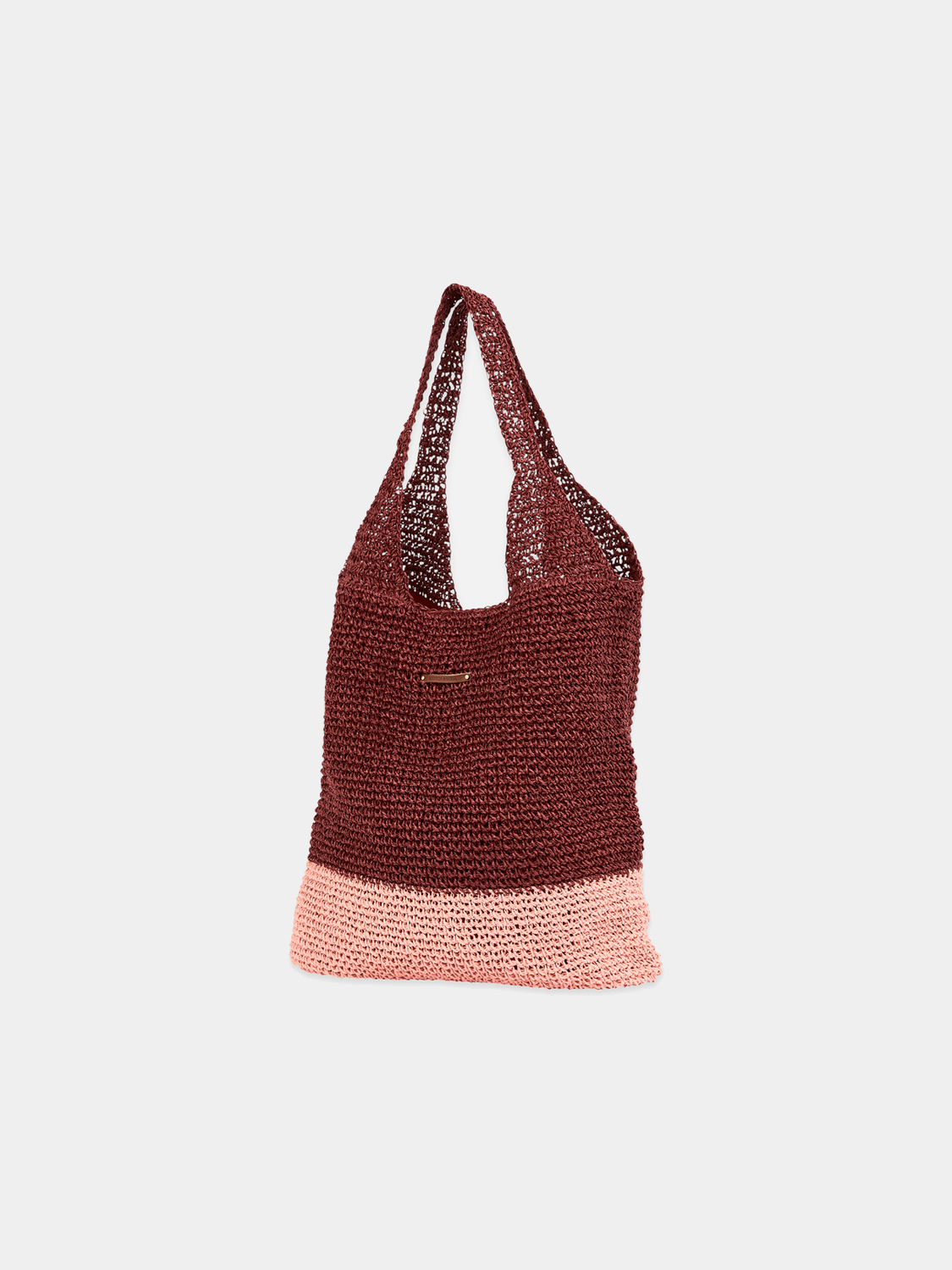 Oversized straw bag by Scotch & Soda with leather handles and woven design, perfect for casual summer outings.