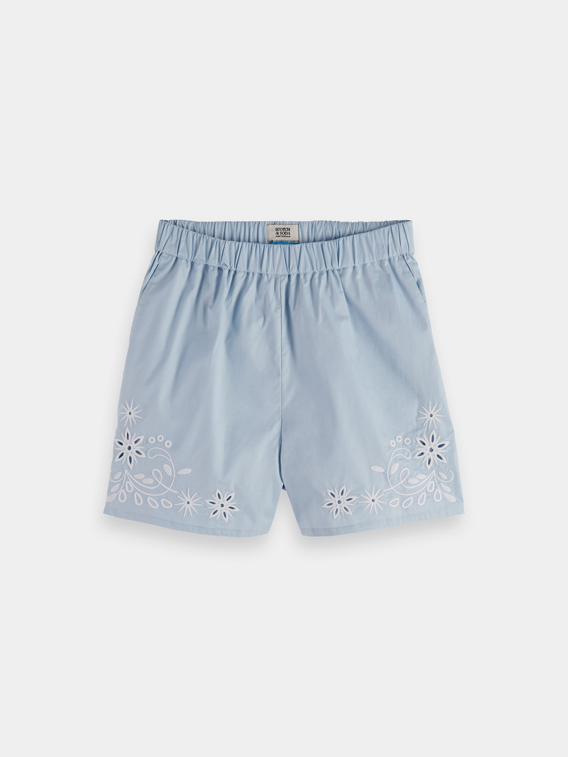 Pair of Scotch & Soda broderie shorts featuring intricate embroidery and a relaxed fit, perfect for casual summer wear.