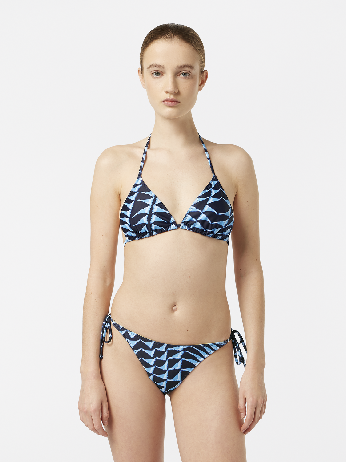 Printed swimwear bikini top by Scotch & Soda featuring colorful floral patterns and adjustable straps.