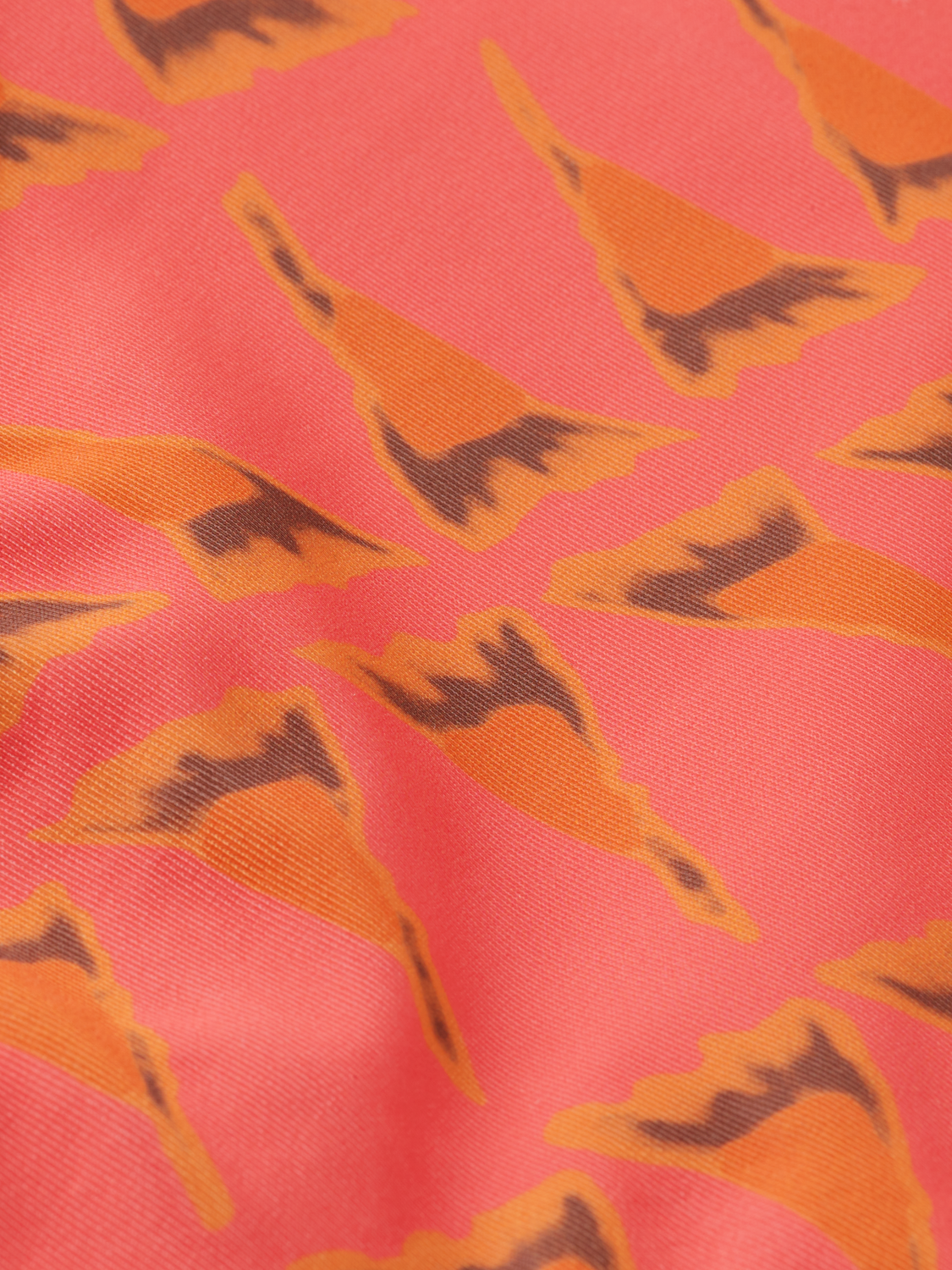 Printed bikini bottom from SCOTCH & SODA swimwear featuring colorful floral pattern and adjustable side ties.