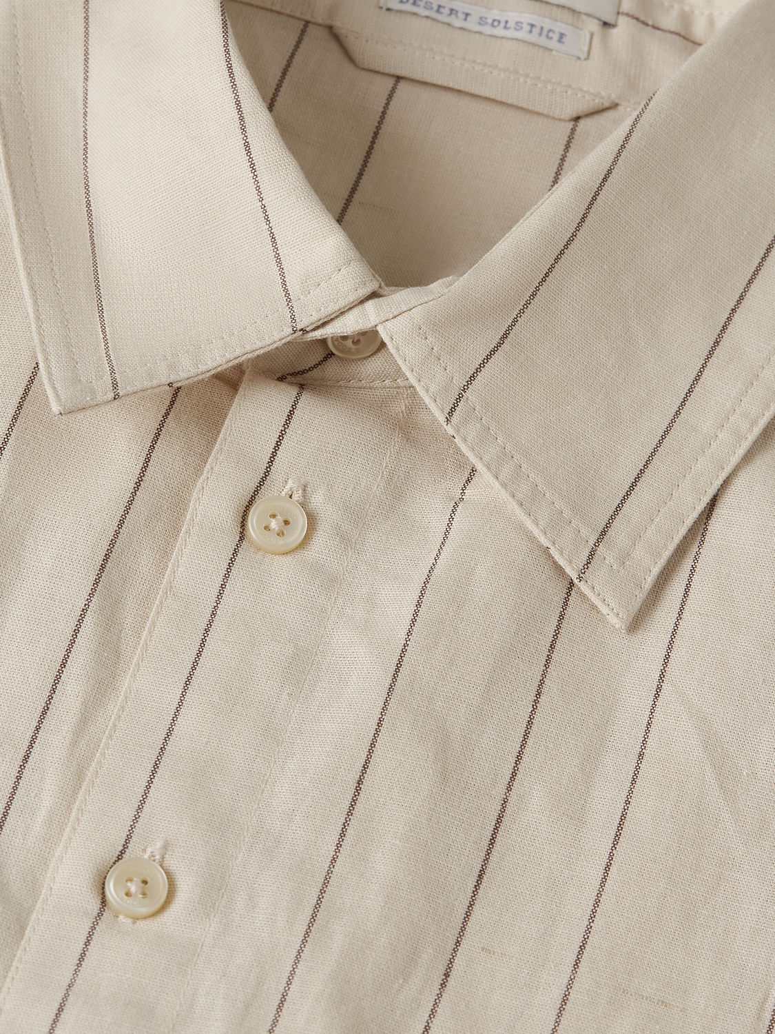 Scotch & Soda pinstripe playsuit jumpsuit with short sleeves and button front, featuring a stylish, tailored design.