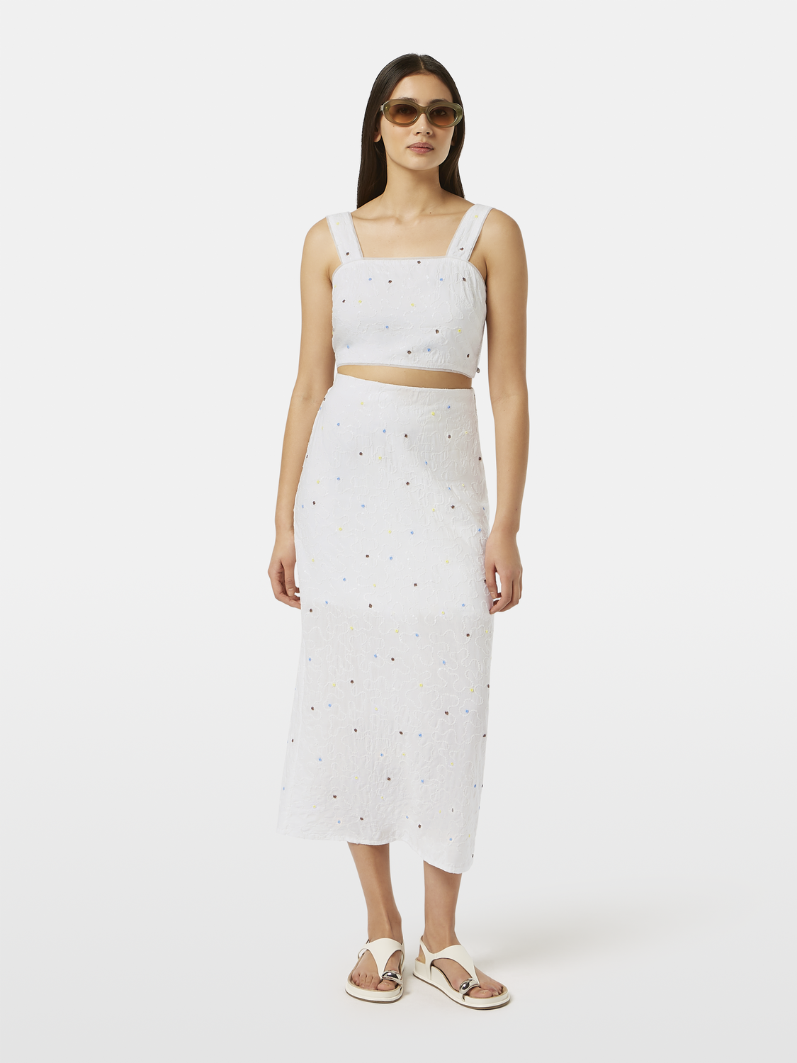 Beaded midi skirt by Scotch & Soda, featuring intricate beadwork and flowing fabric, displayed on a mannequin.