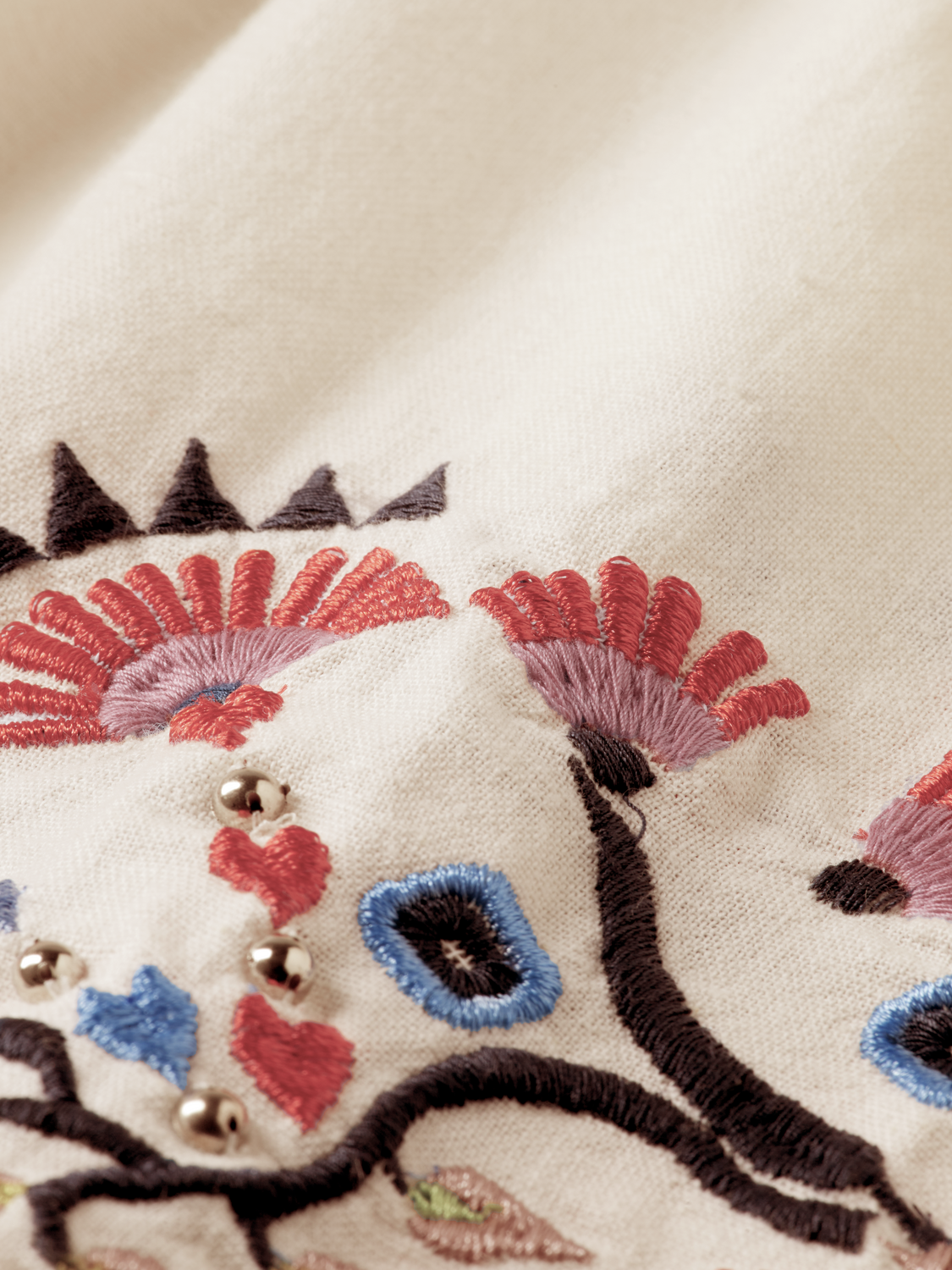 Embroidered maxi skirt by Scotch & Soda with intricate floral embroidery, flowing fabric, and a stylish, bohemian design.