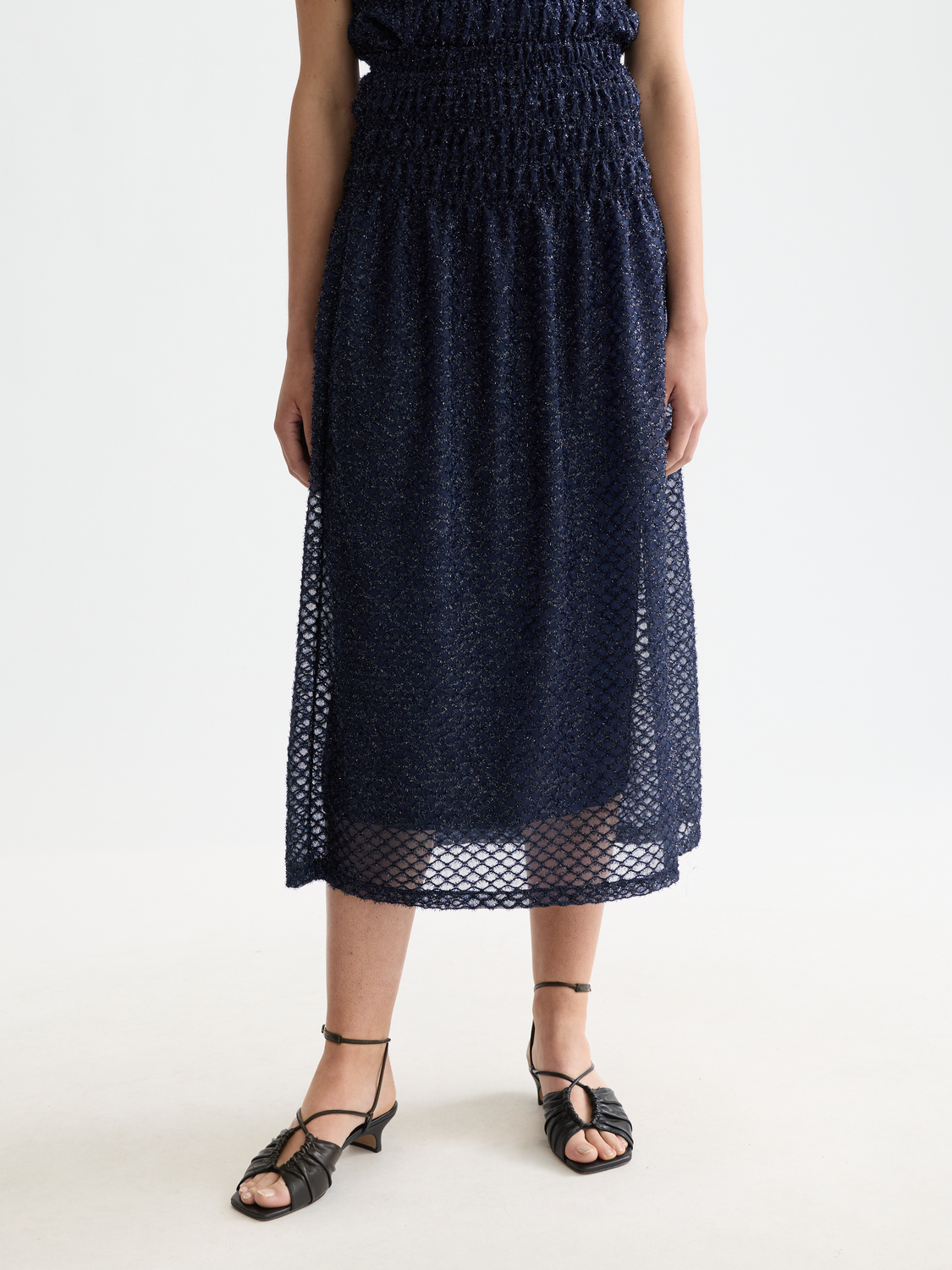 Silver Lurex midi skirt by Scotch & Soda, featuring shiny metallic fabric and a flowing, stylish design.